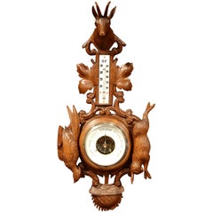 19th Century French Black Forest Carved Walnut Barometer with Hunt Decor