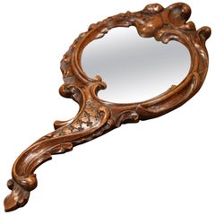 19th Century French Black Forest Carved Walnut Hand Mirror with Beveled Glass