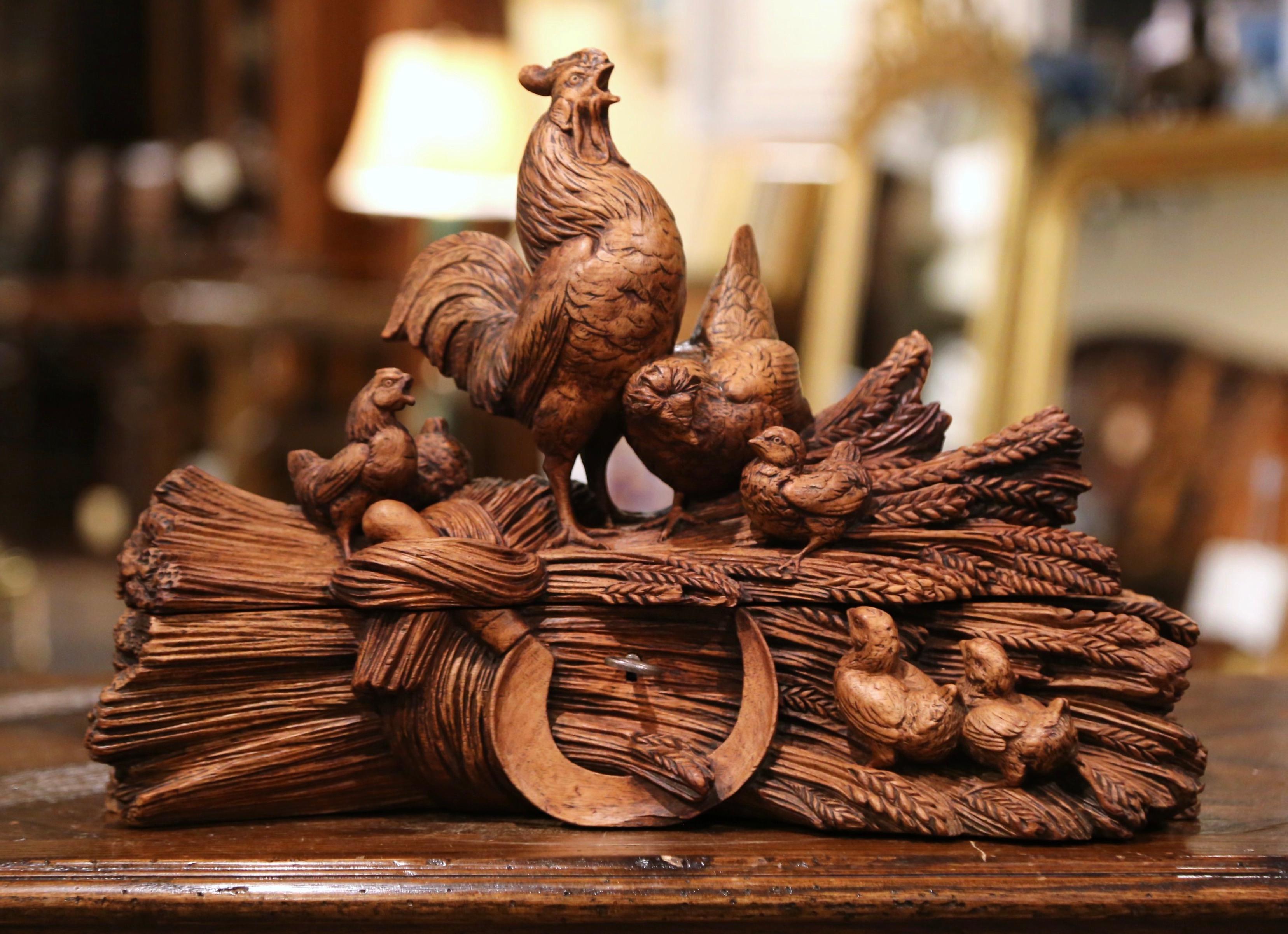 Place your jewelry and small valuable treasures in this beautifully carved decorative box. Created in France, circa 1880, the fruitwood chicken composition features high quality carving, including a rooster and hen with five chicks all of them