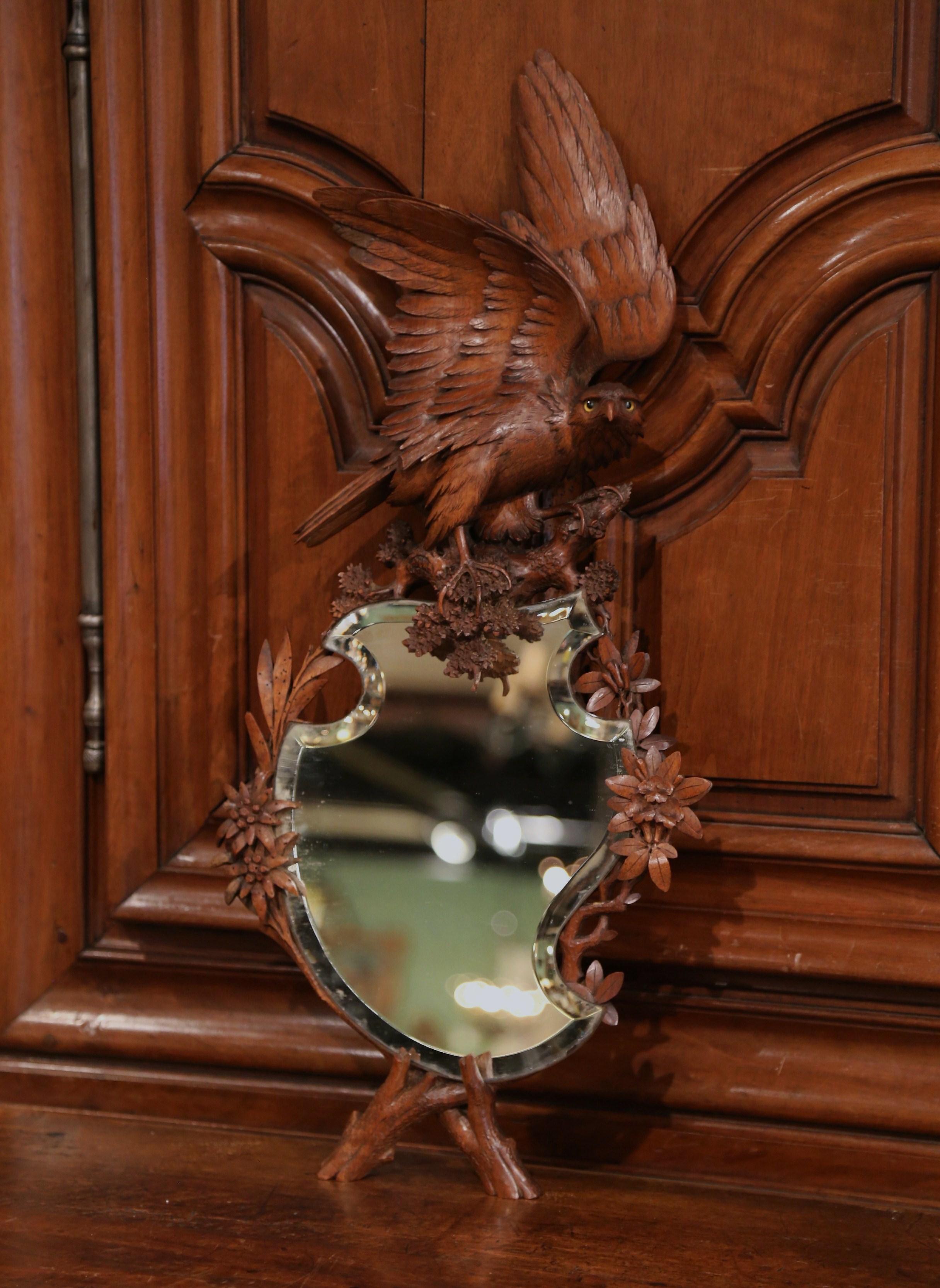 Patinated 19th Century French Black Forest Carved Walnut Mirror with Eagle Sculpture