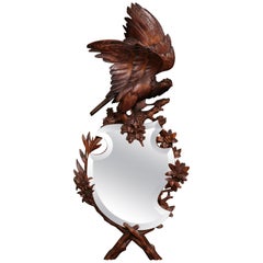 19th Century French Black Forest Carved Walnut Mirror with Eagle Sculpture
