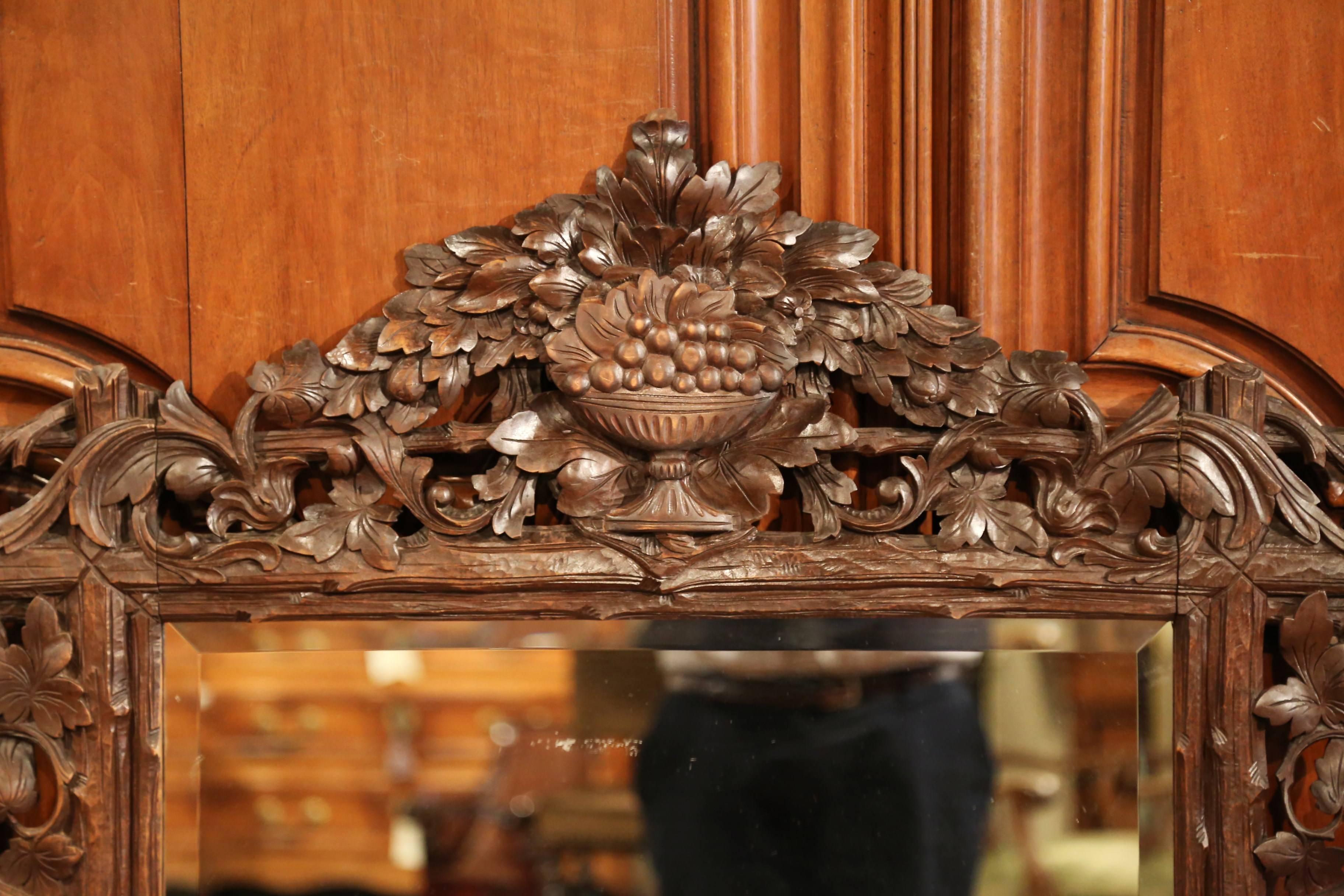 Patinated 19th Century French Black Forest Carved Walnut Mirror with Grapes and Foliage