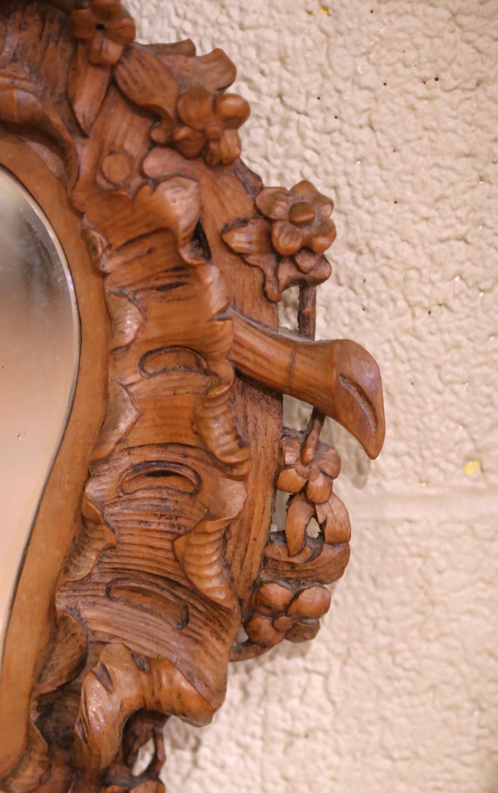Hand-Carved 19th Century French Black Forest Carved Walnut Wall Mirror with Foliage Motifs For Sale