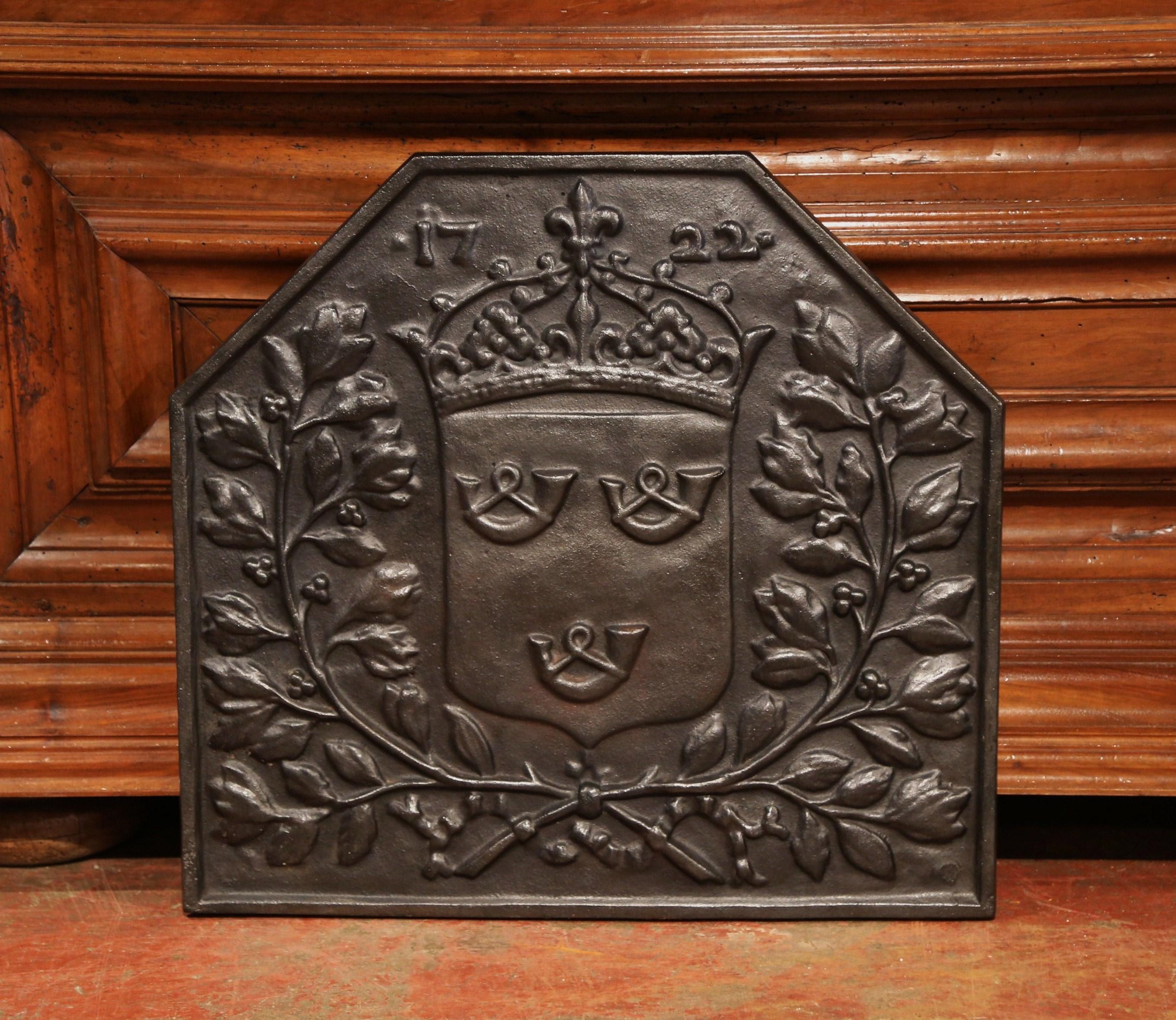 Patinated 19th Century French Black Iron Fireback with Crown, Family Crest and Foliage For Sale
