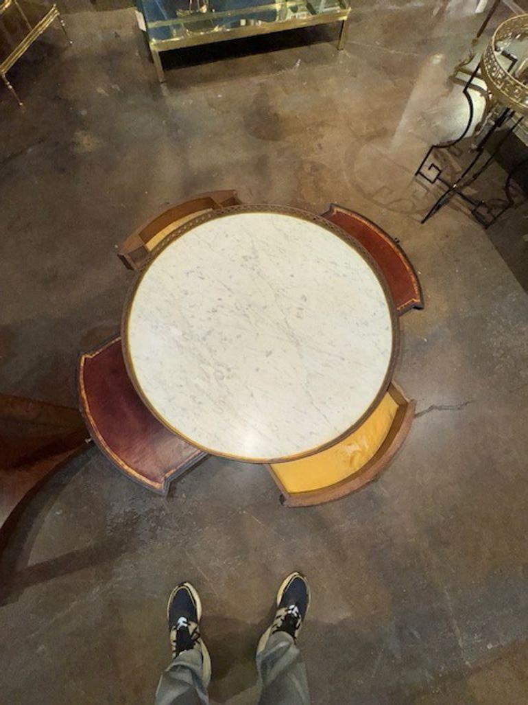 The 19th Century French Black Lacquered Chinoiserie Bouillotte Table features intricate chinoiserie designs, adding a touch of elegance and sophistication to any home decor. Perfect for use as a side table or accent piece, this bouillotte table is