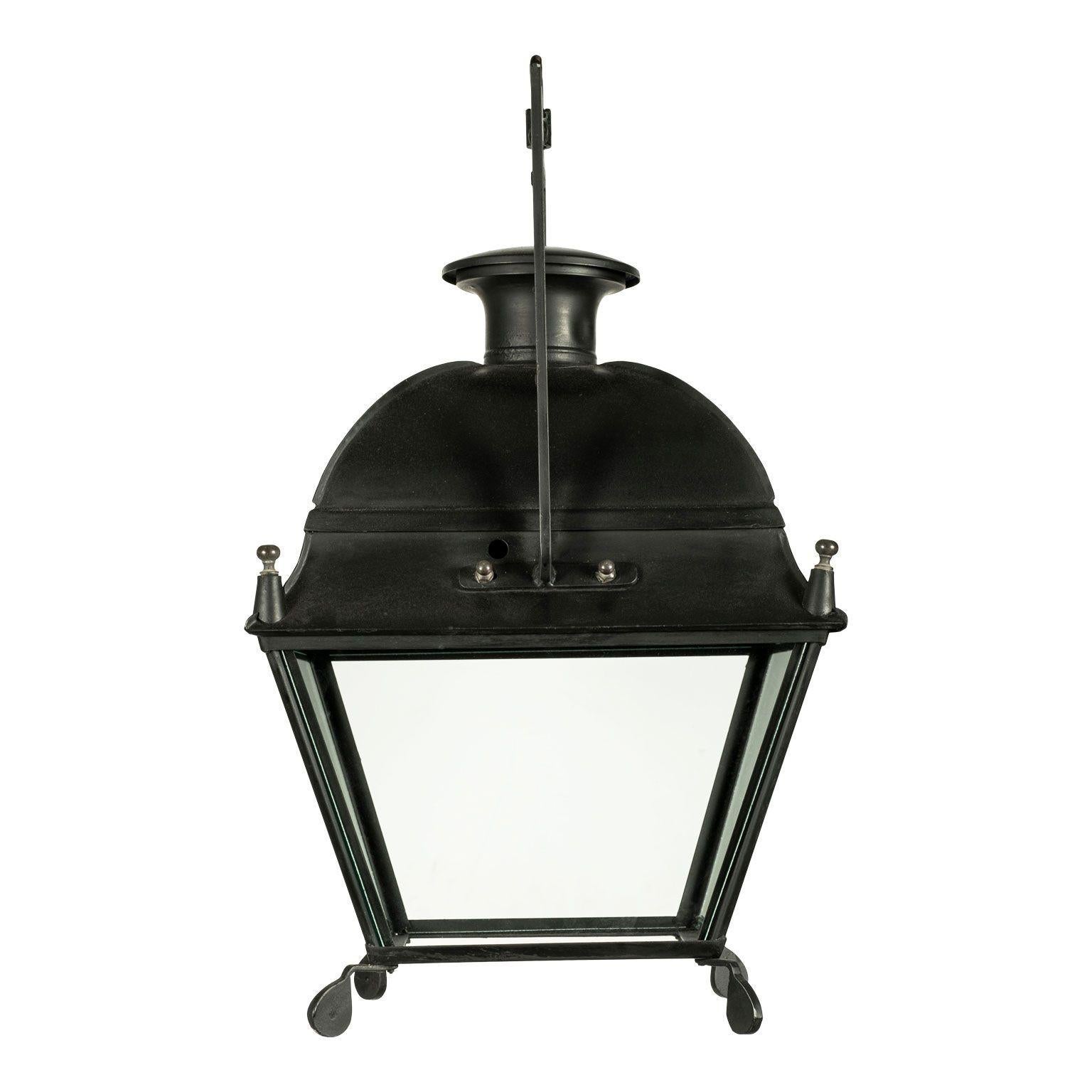 19th century French black painted tole lantern with glass paneled sides. One of four similar lanterns (see listings 742B, 742C and 742D).