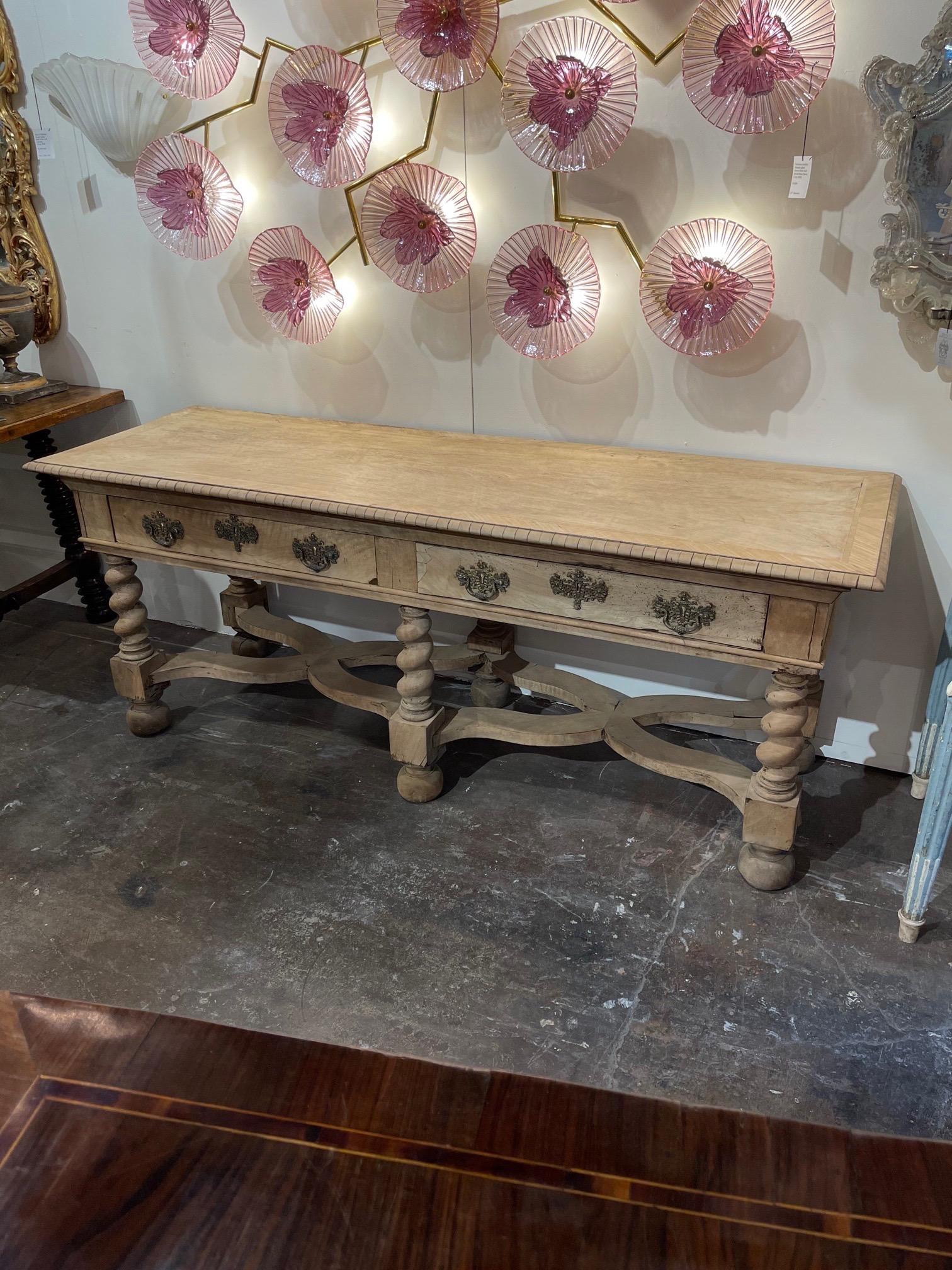 Beautiful 19th century French bleached walnut sofa table with barley twist legs. Nice patina on this substantial table. This would also work well in a hall or entry way. A very fine piece!