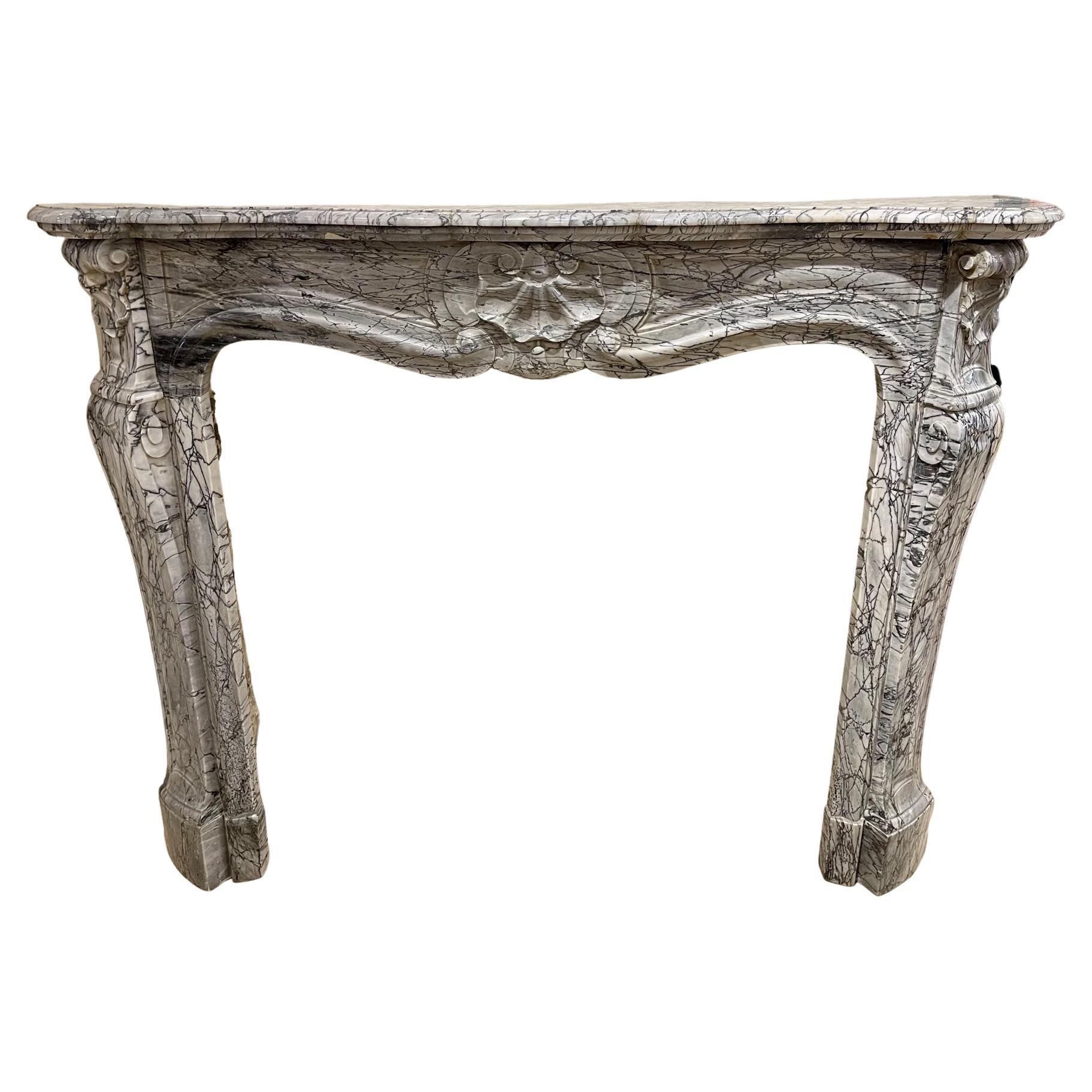 19th Century French Bleu Turquin Louis XV Style Carved Marble Mantel