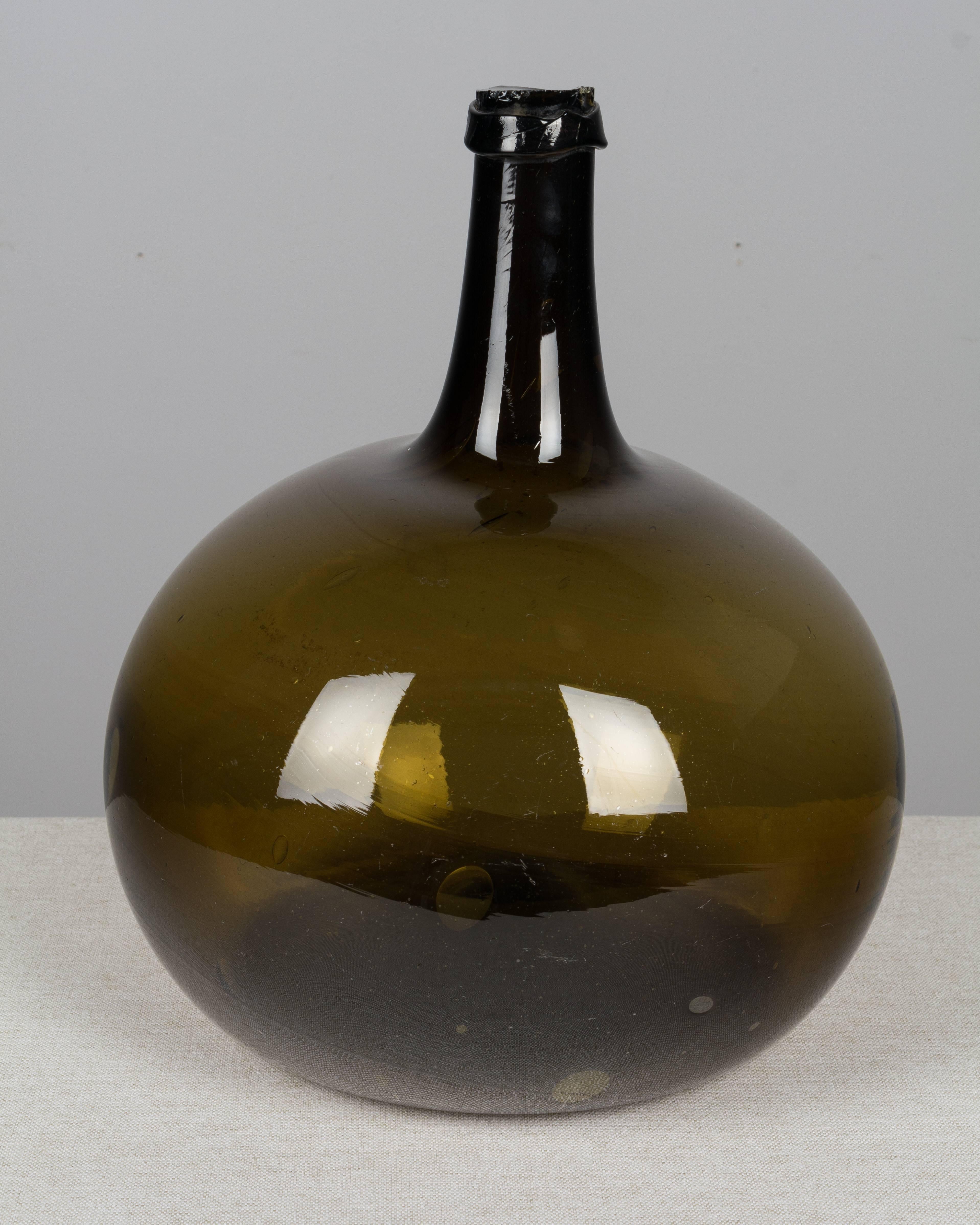 Hand-Crafted 19th Century French Blown Glass Demijohn Bottle