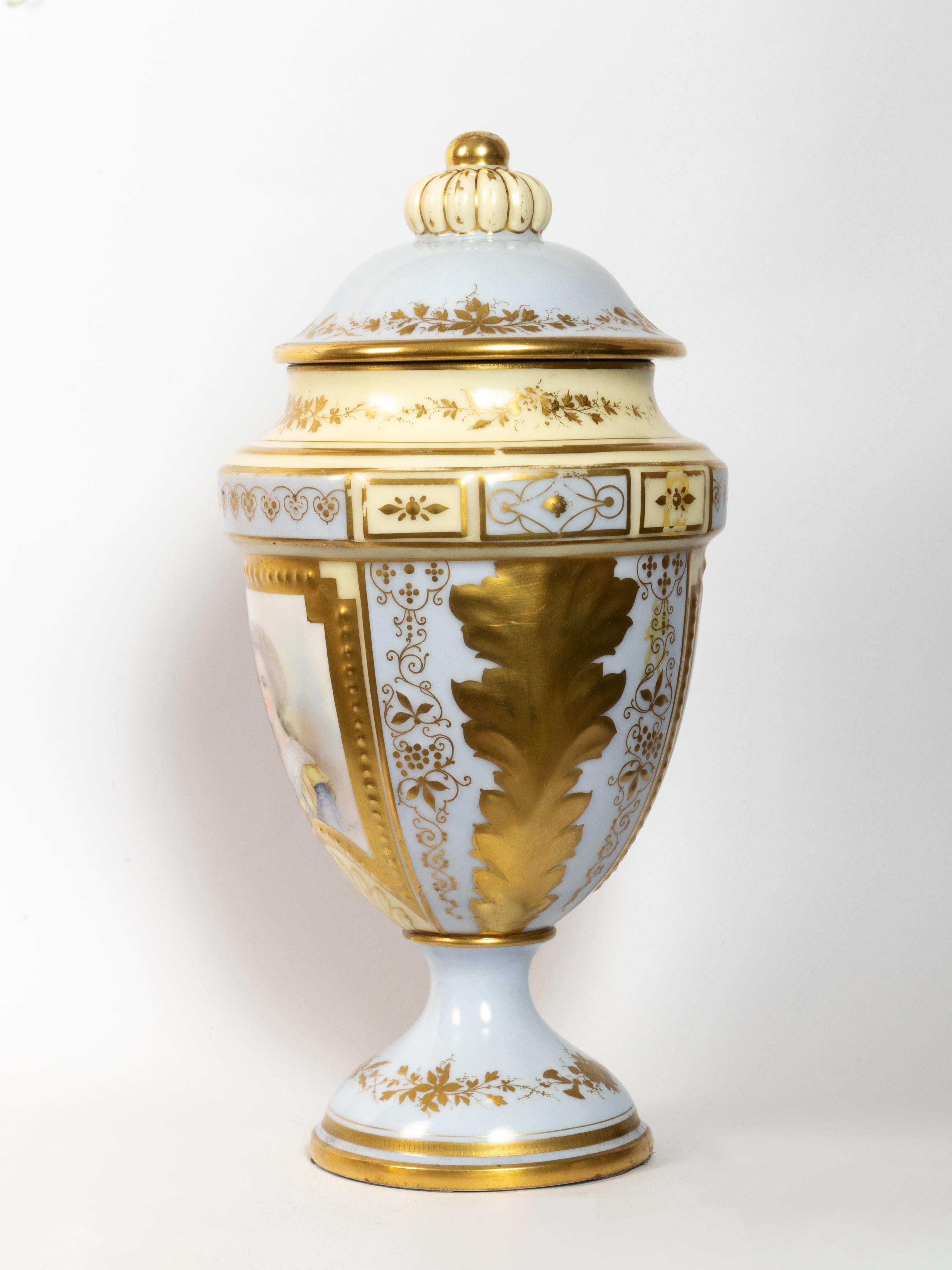 This exquisite Sevres vase from the 19th century features a delicate light blue porcelain body adorned with beautifully etched friezes and foliages. 
The golden painting adds a touch of elegance, while the pumpkin-shaped top showcases the iconic