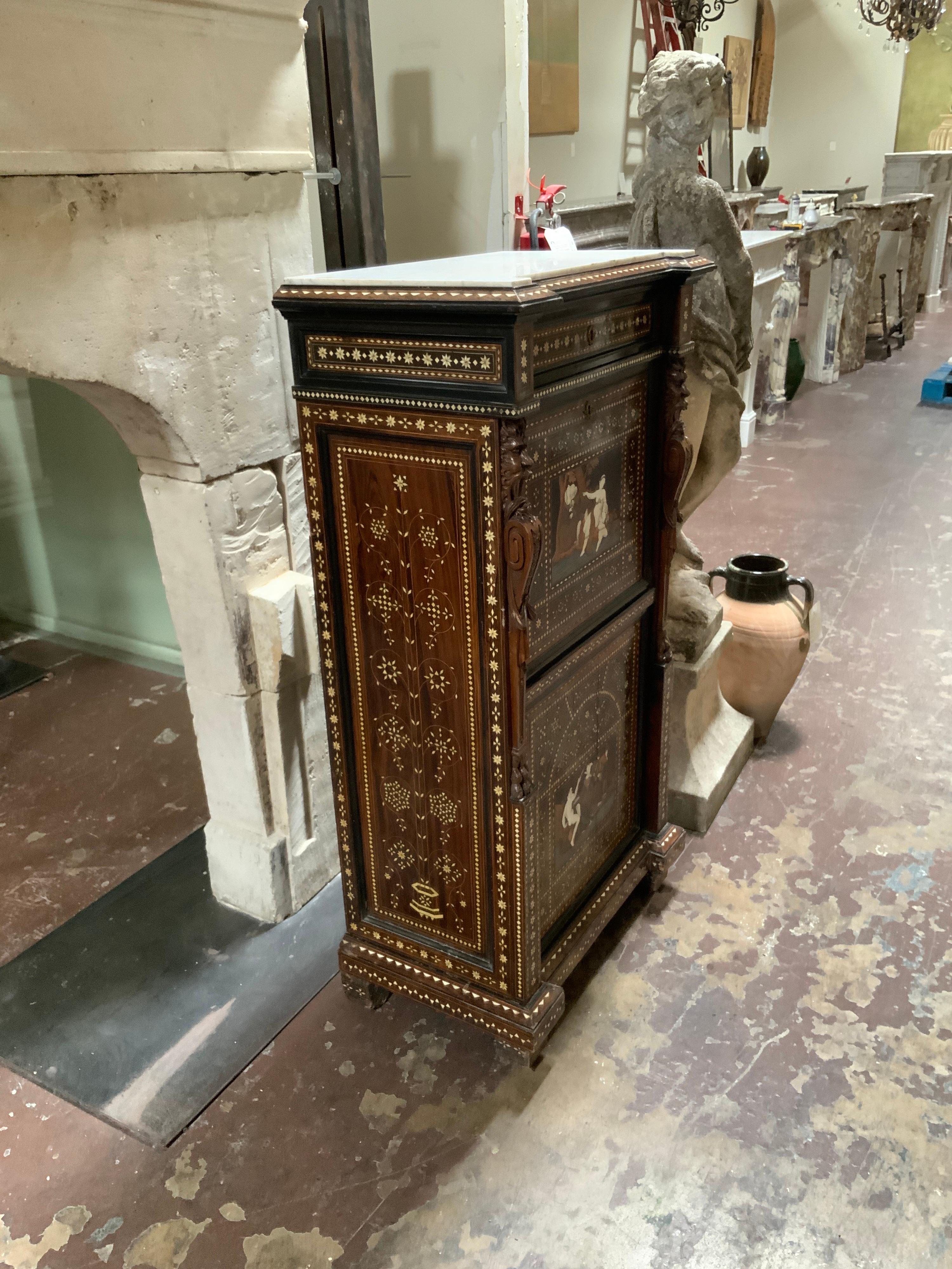Pictured is a beautiful and detailed bone inlay cabinet originating from France, circa 1850.