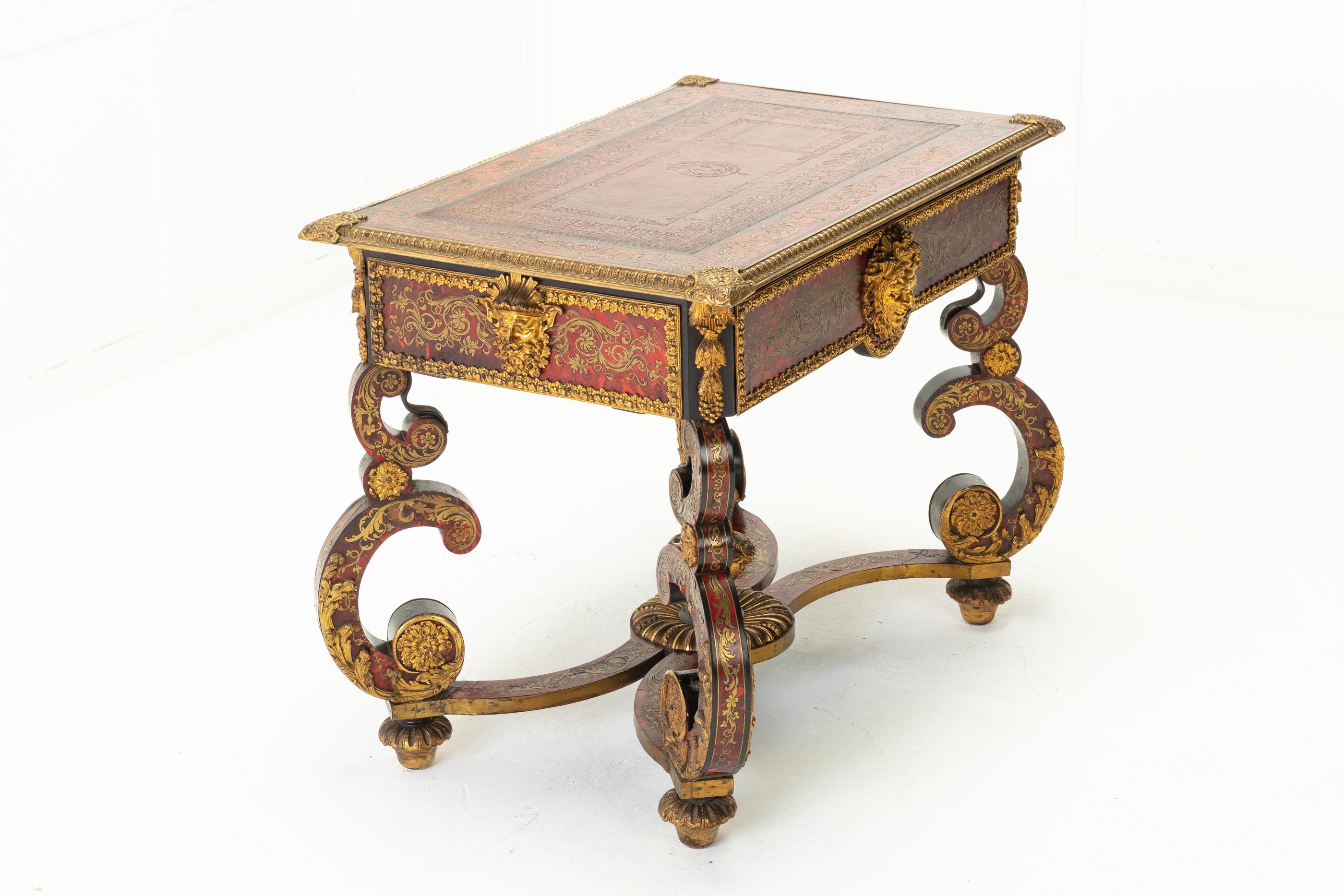 An exceptional 19th century French boulle bureau plat of outstanding quality. Having engraved brass and red tortoise shell, we feel this is an early 19th century table, possibly made to match an 18th century one.

Some of the finest boulle work
