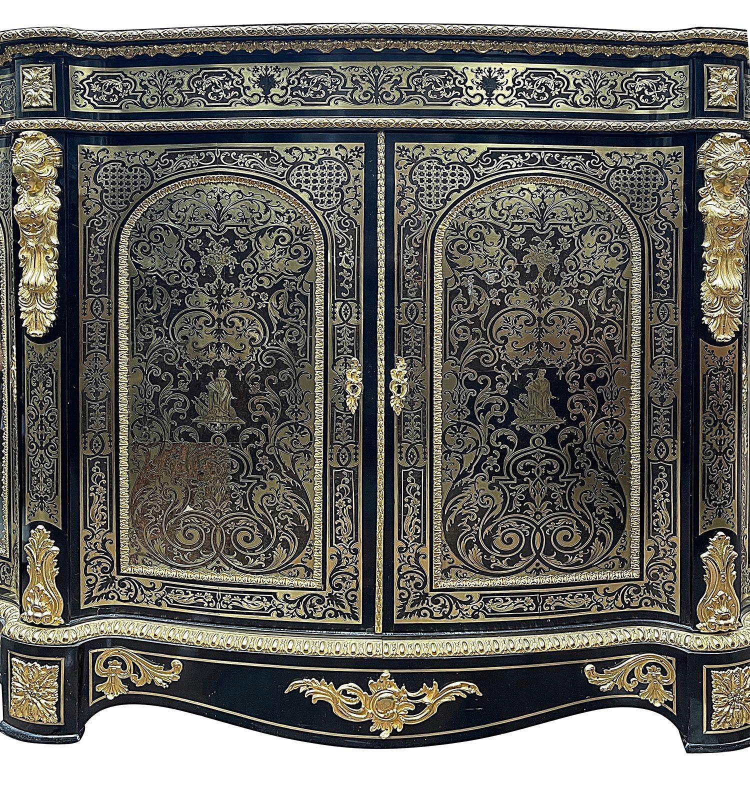 A good quality 19th Century French boulle, serpentine fronted Credenza. Having gilded ormolu foliate mounts and mouldings. Wonderful brass inlay to the doors, each with classical motif and scrolling decoration.
 
 
Batch 73 62161 YTKZ