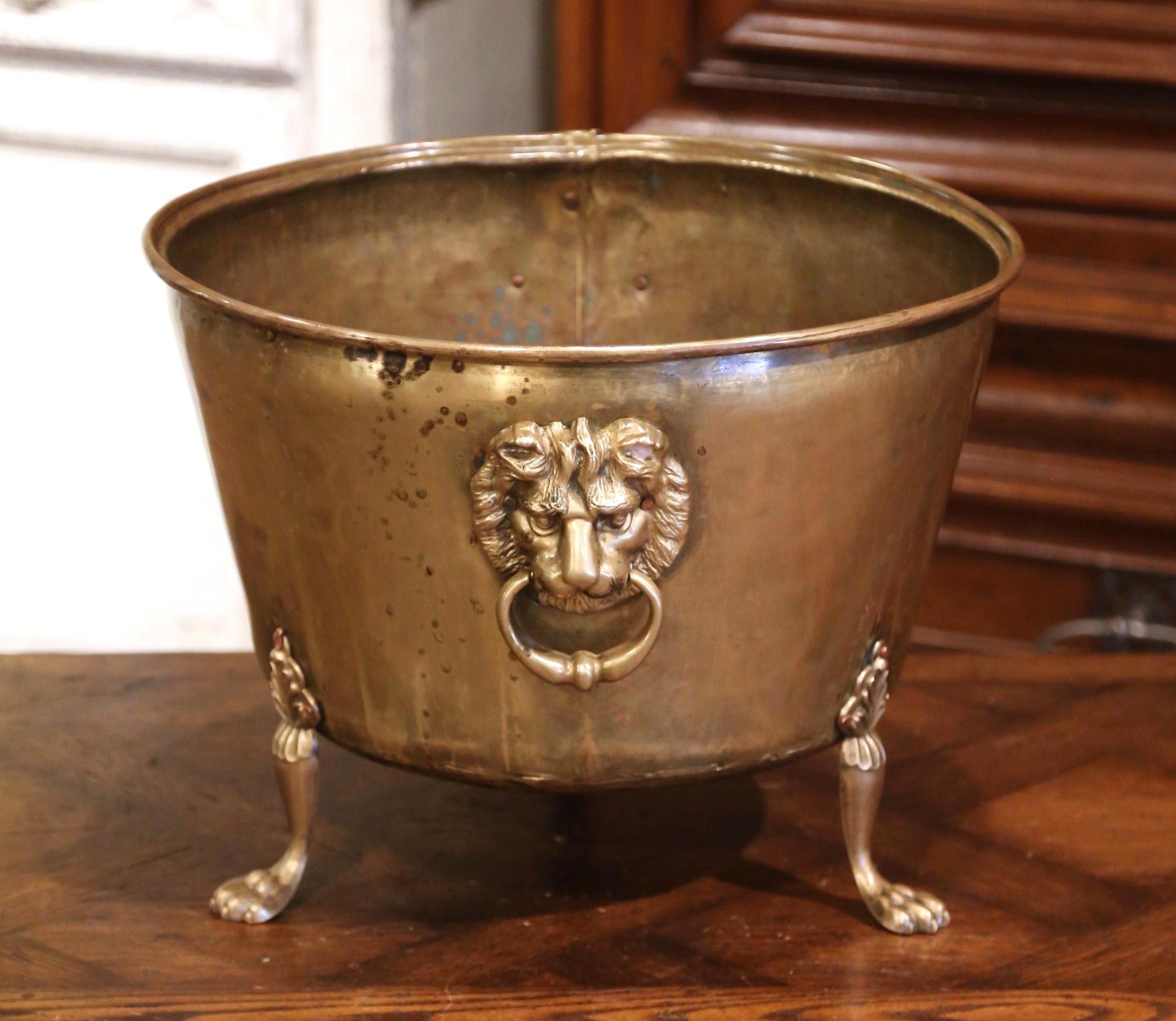 brass planter with lion head handles