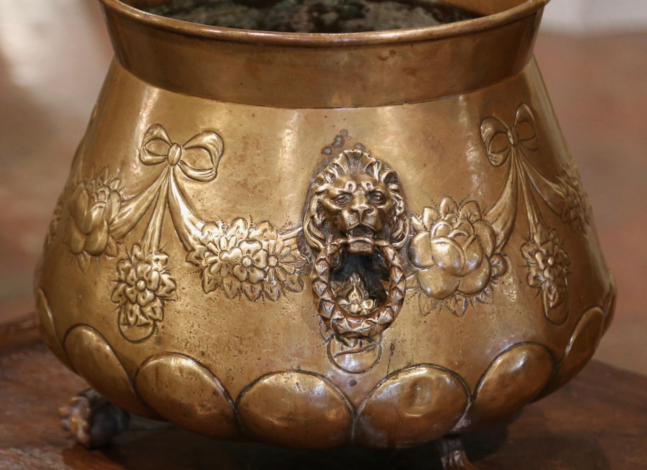 Repoussé 19th Century French Brass Cache-Pot with Lion Head Handles and Repousse Decor