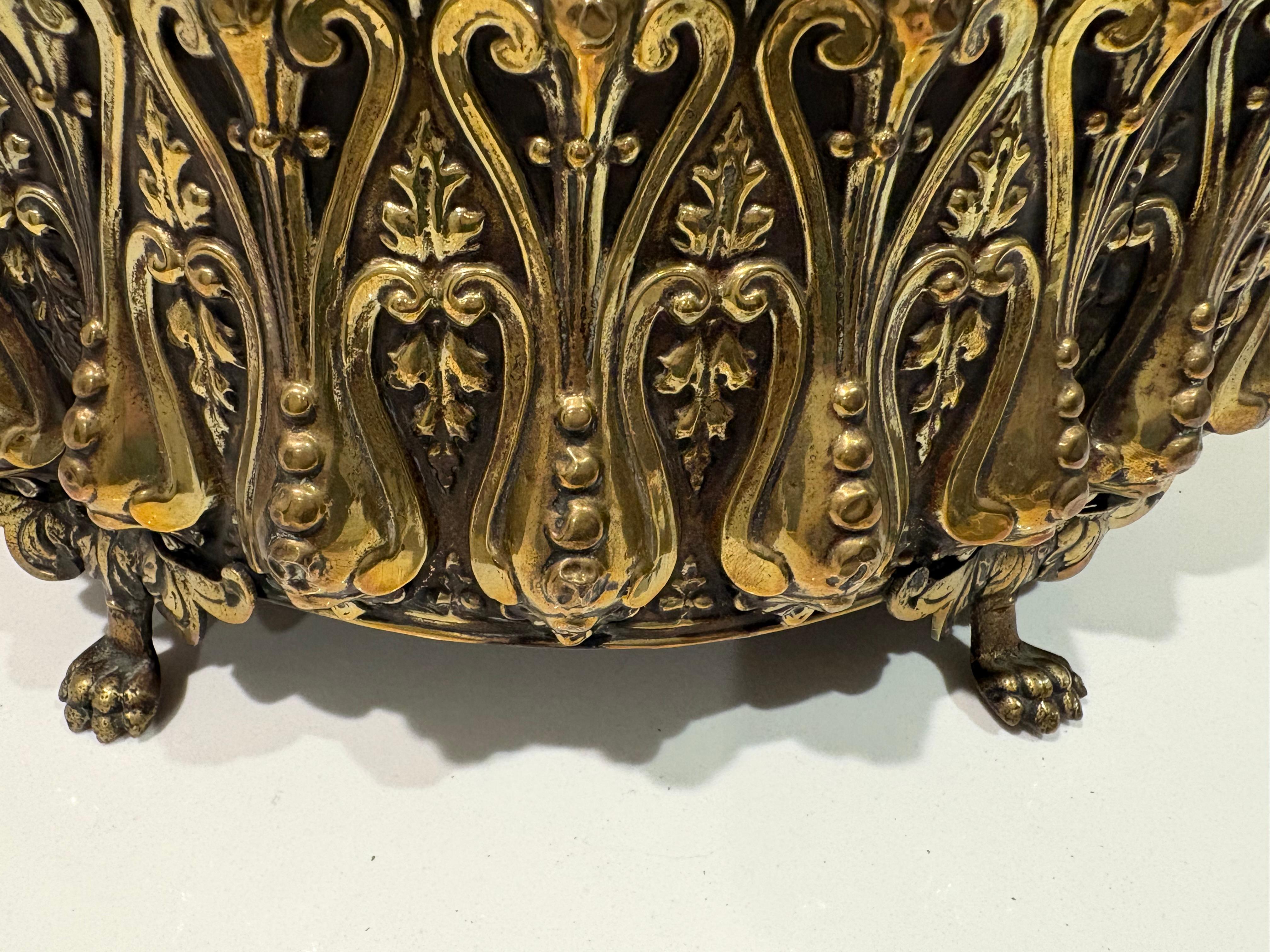 Repoussé 19th century French Brass Jardiniere on feet with tin liner