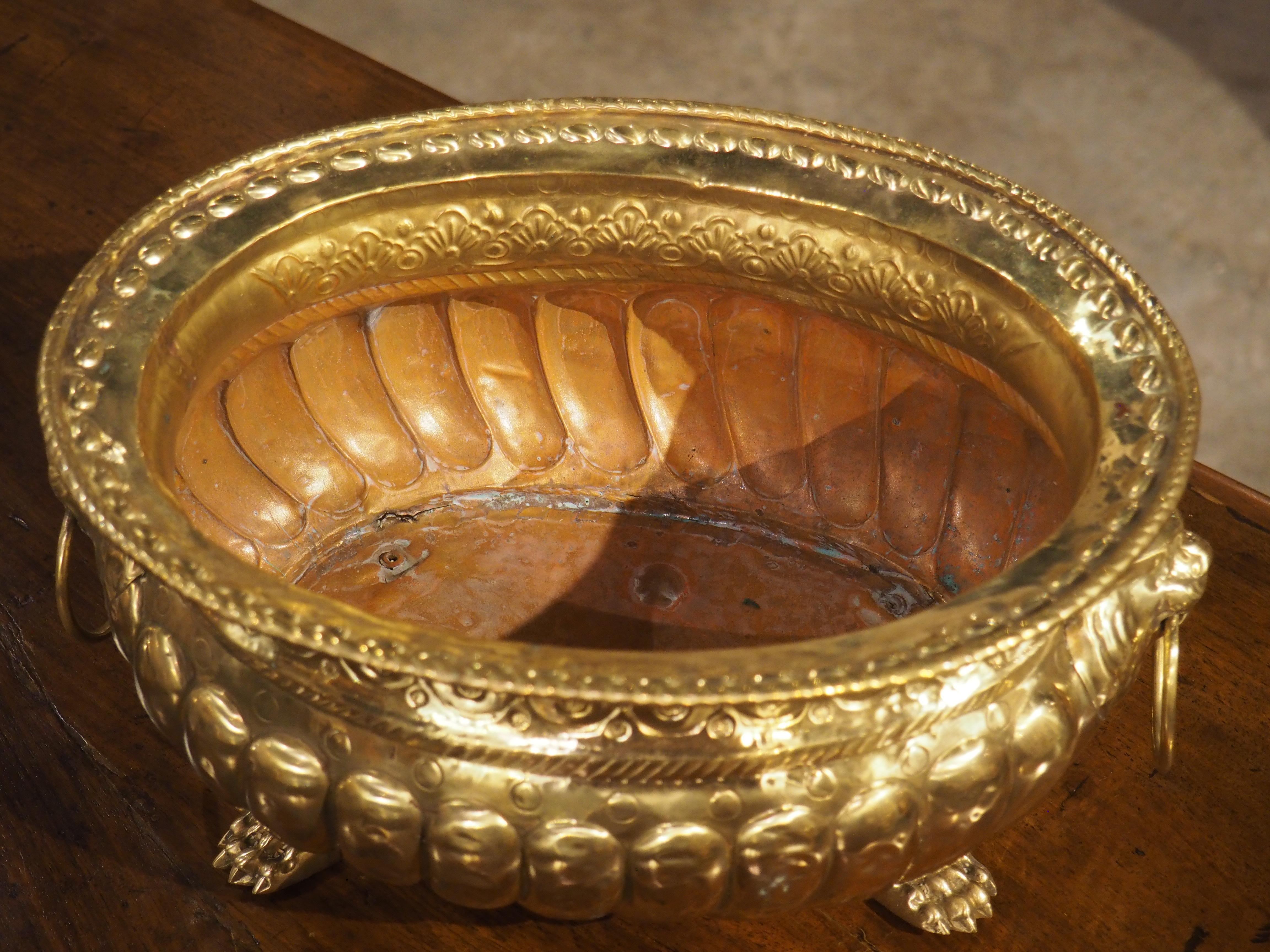 Metal 19th Century French Brass Lobed Jardiniere with Lion Mascarons and Paw Feet
