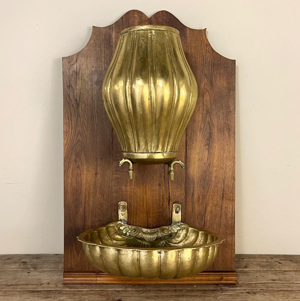 19th century French brass wall fountain ~ Lavabo is a charming relic from a bygone era! Back before the days of ubiquitous running water in every room of the house, folks were obliged to create ingenious solutions like this wall fountain. Such a