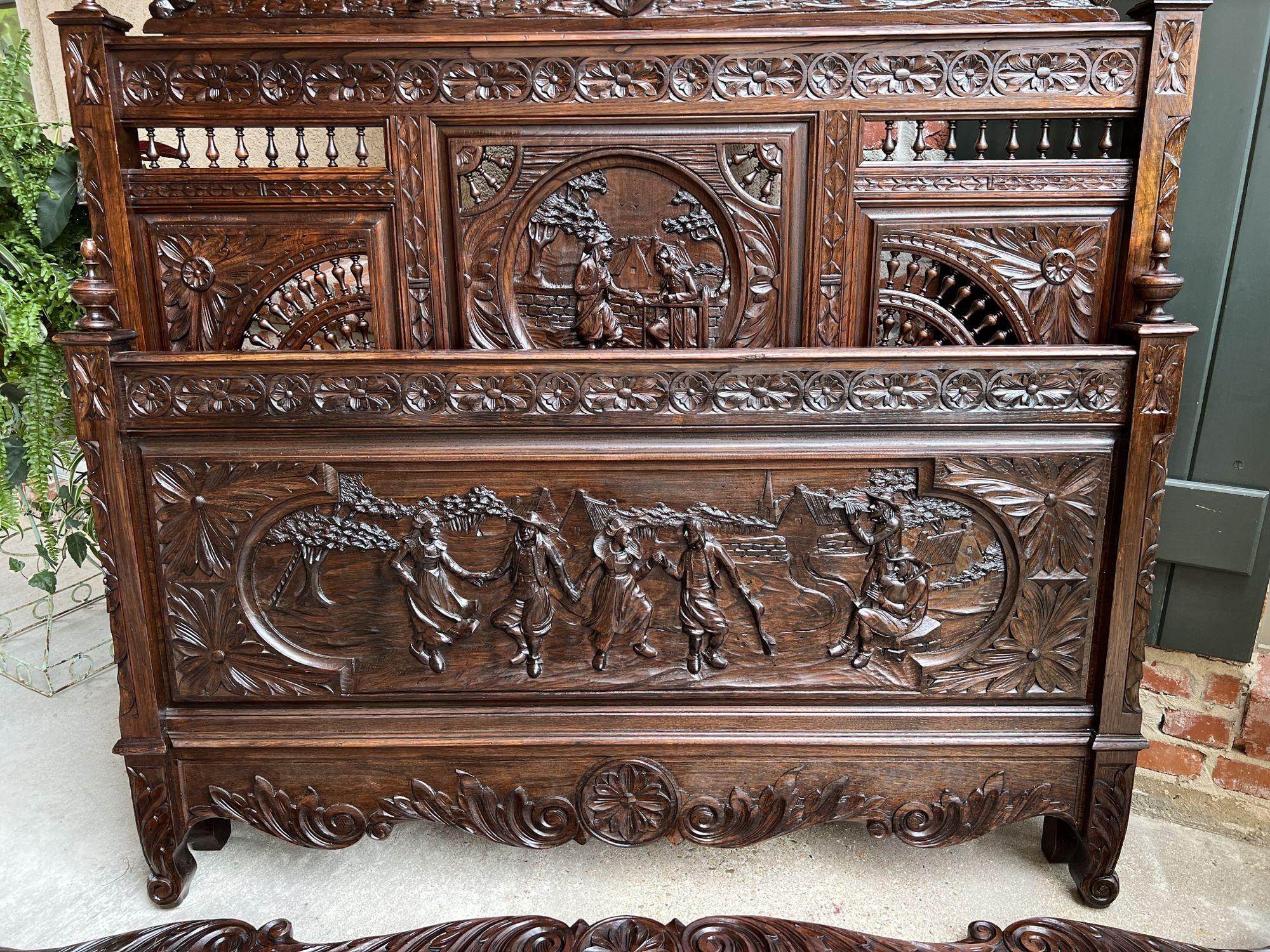 19th century French Breton bed carved Oak Brittany Wedding French Country.
 
Unique antique French bed, direct from the Brittany region, highly carved with details particular to the Breton style.
Most probably a commissioned piece for the wedding