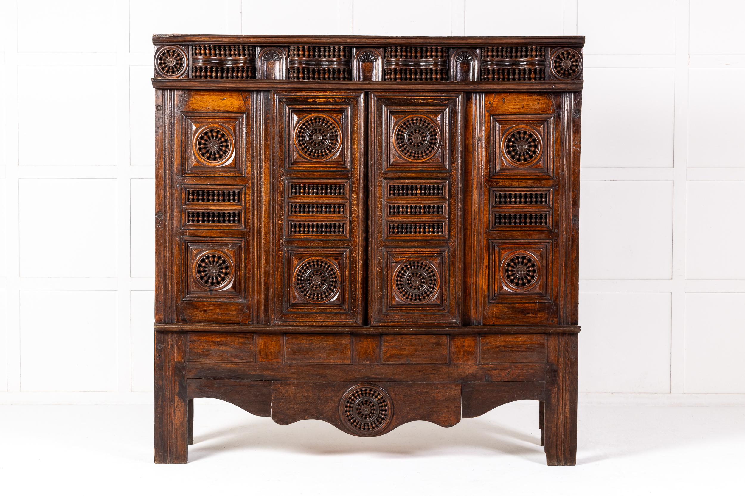 An Interesting 19th Century French Breton Oak Cabinet with Exceptional Bobbin Turned Detail.

This lovely small cabinet is made of the finest quality oak with the majority of the decoration throughout being provided by large numbers of hand turned