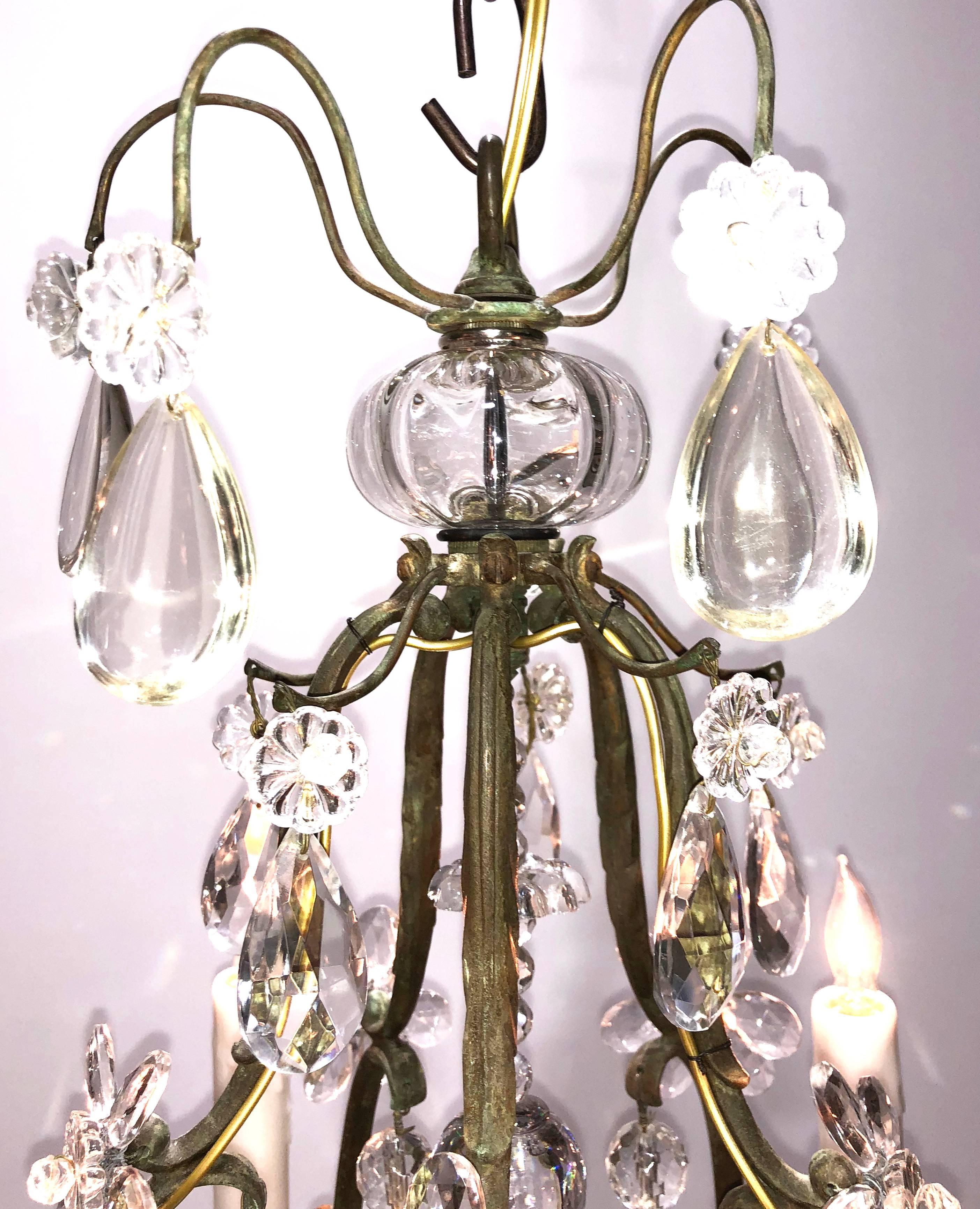 19th century French bronze and crystal birdcage chandelier, circa 1840. Originally a candle chandelier that has been electrified. Faceted crystal spires accented with smoke crystals.
