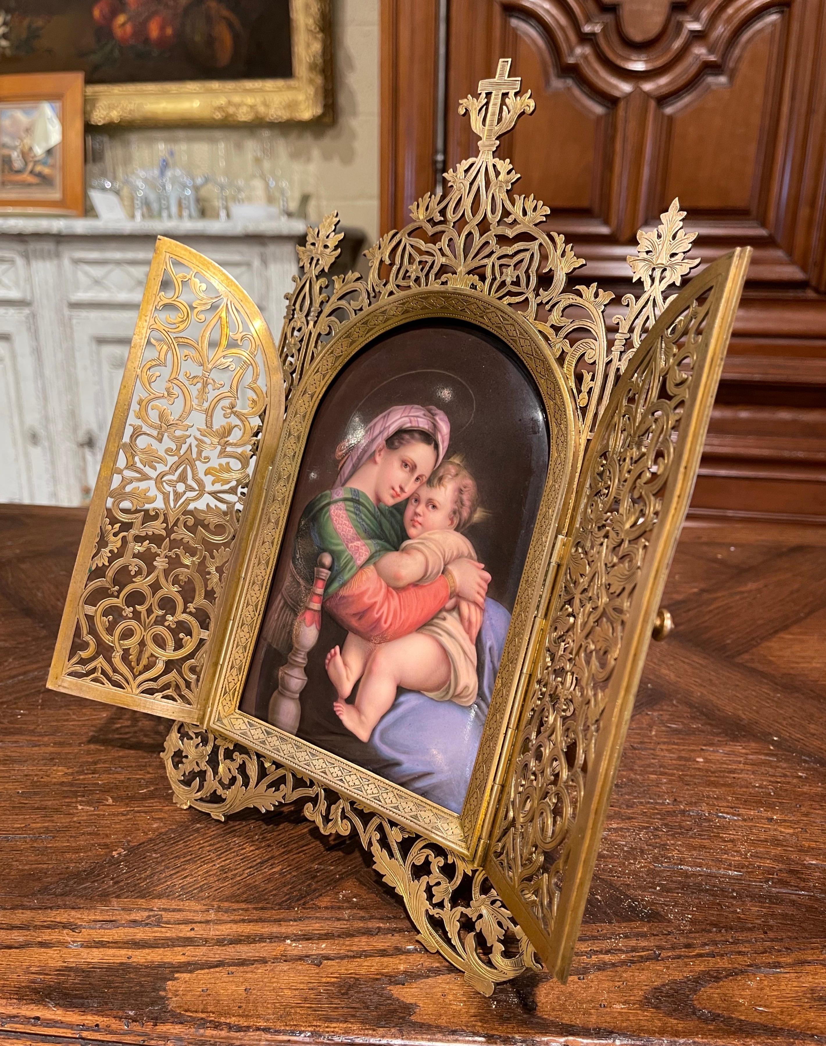 Place this antique Gothic triptych on a table for your daily devotions!. Created in southern France circa 1860, and made of bronze, the religious work of art is built in three panels hinged together which can be folded shut or displayed open, and