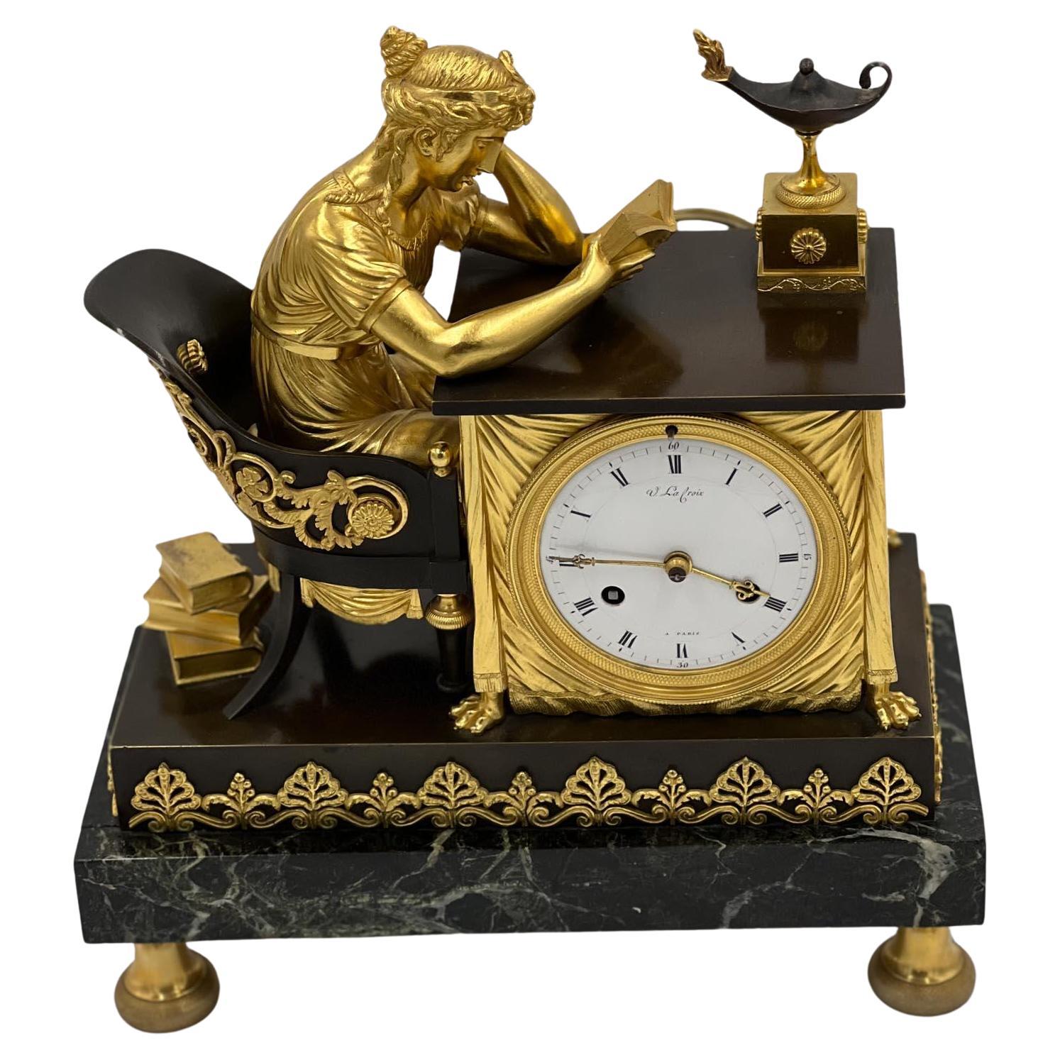 Französische Uhr aus Bronze und Goldbronze des 19. Jahrhunderts