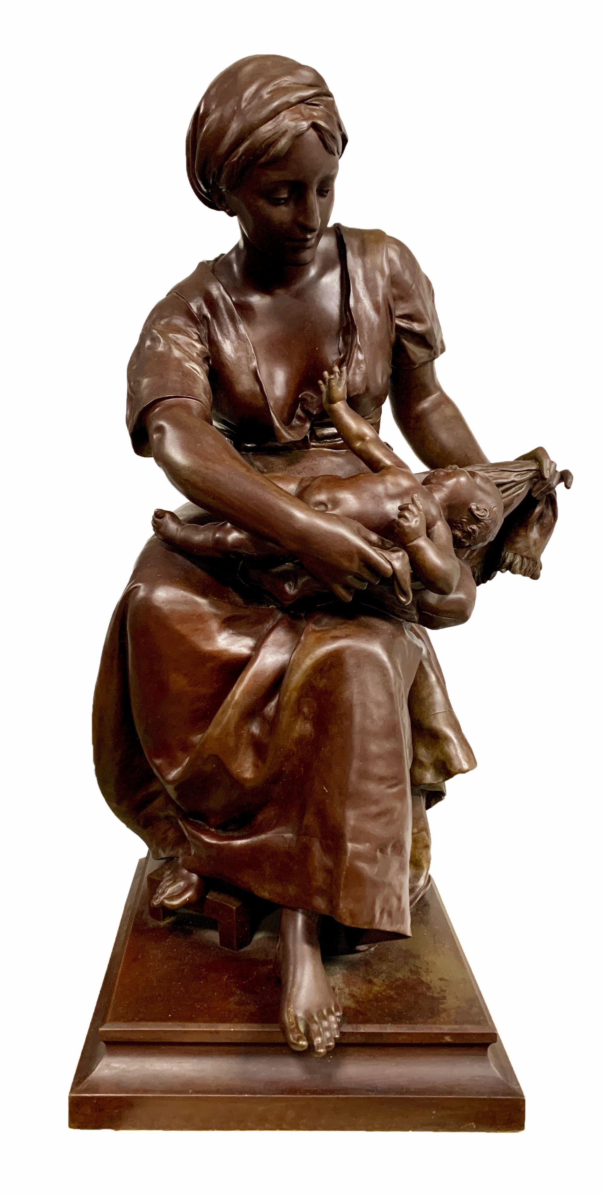 Pierre Louis Détrier (French, 1822–1897)
This fine patinated bronze sculpture by Detrier depicts a mother and child. The attention to detail can be seen in the delicate treatment of the clothes and the expression of the mother. The baby is seen