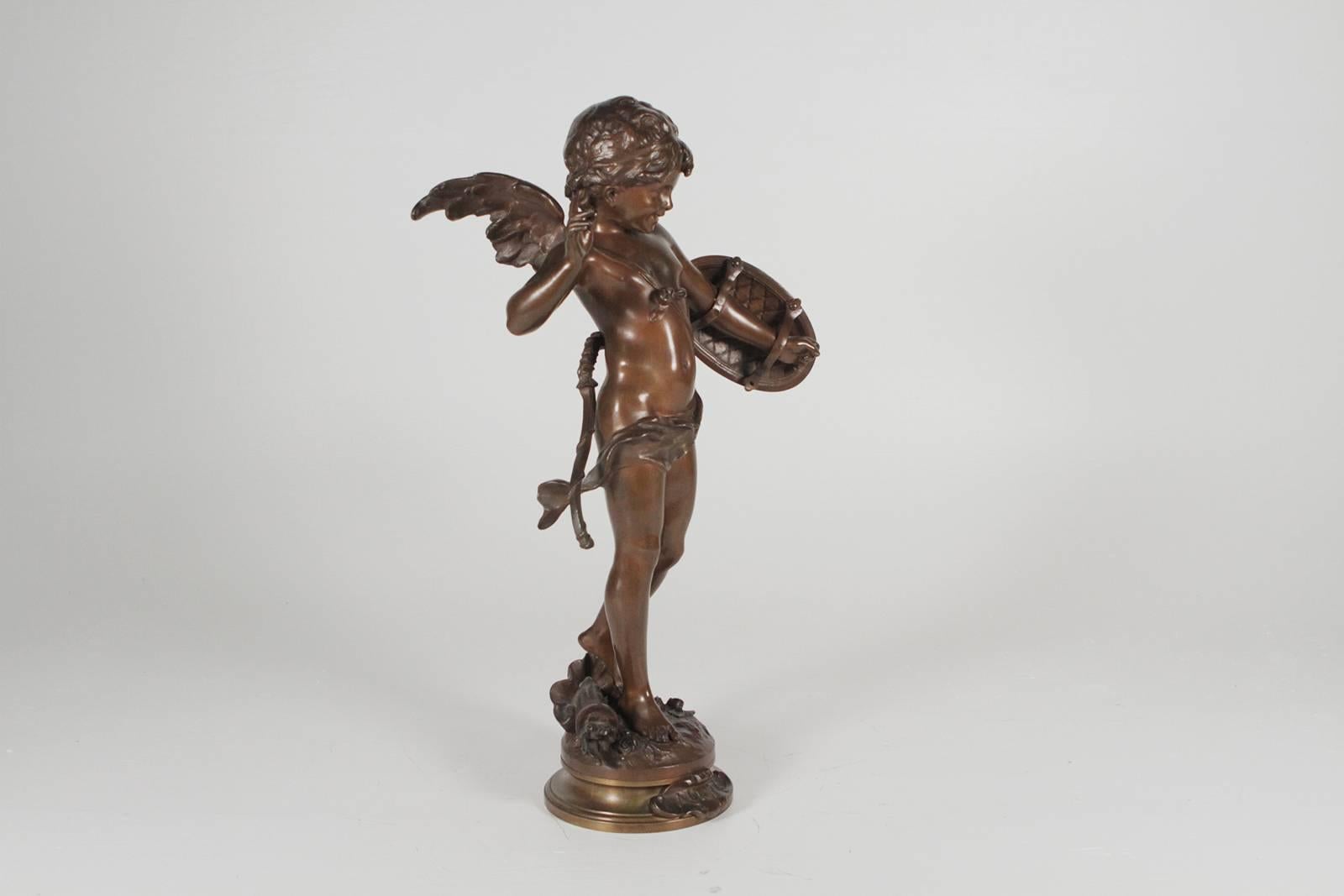 A bronze figure Alerte, Auguste Moreau (French, 1834-1917) The standing figure of cupid modeled with a bow on his back, love-shield on his arm, and a quiver by his feet, mounted atop a raised double base, artist signed and with title plaque.