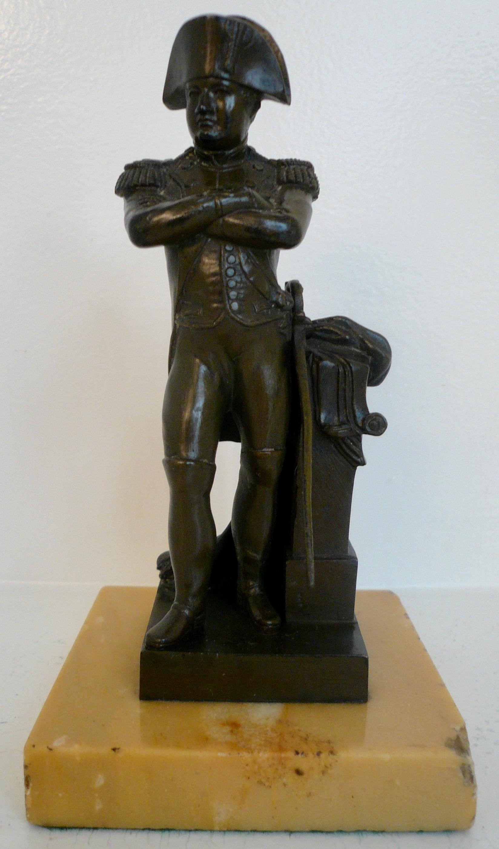 This finely detailed bronze figure of Napoleon is beautifully patinated, and is mounted on a Sienna marble base.