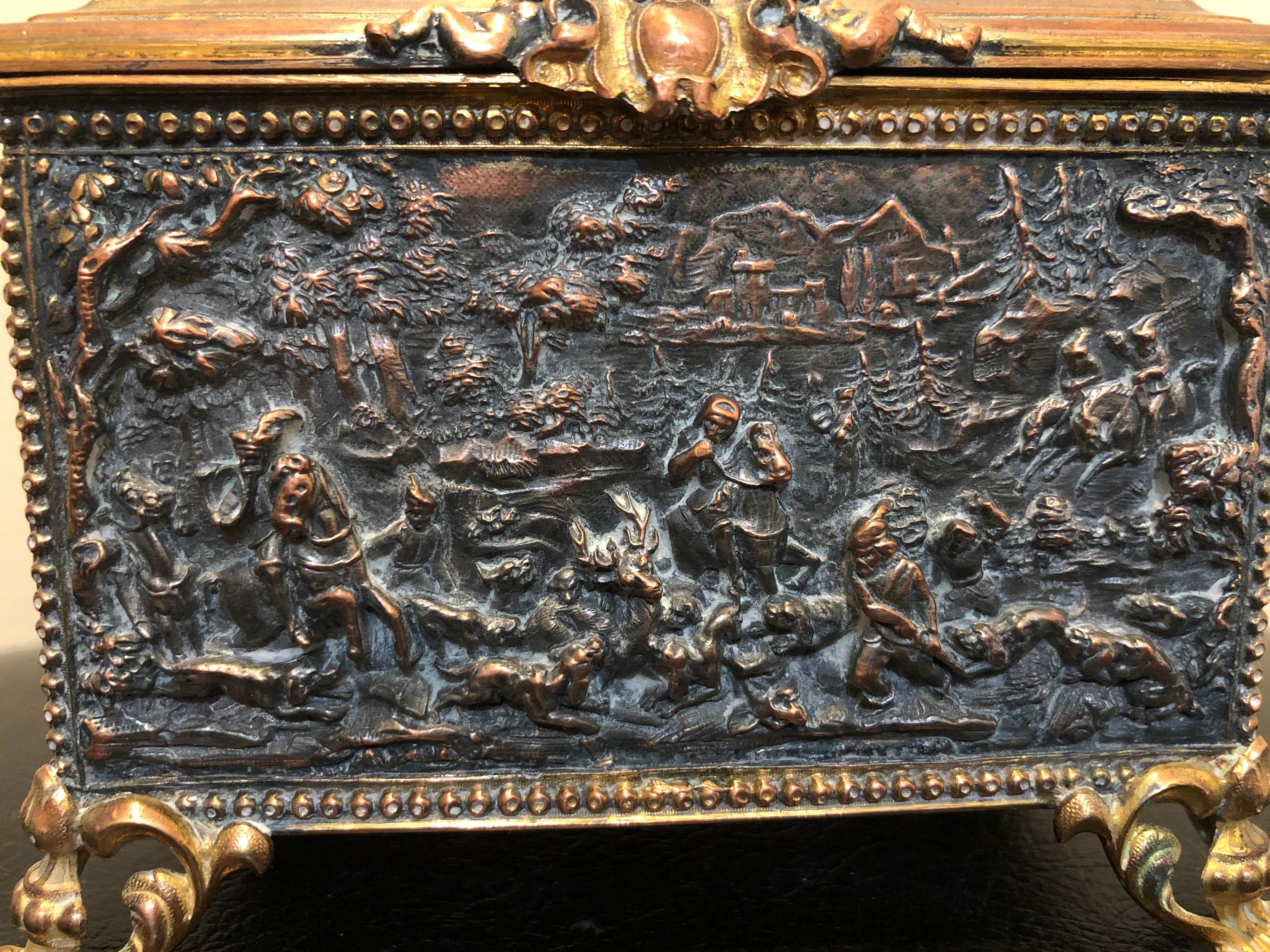 19th century French keepsake box of high relief. It is marked on the bottom AB Paris. The carvings are incredibly detailed. Made from bronze and or brass.