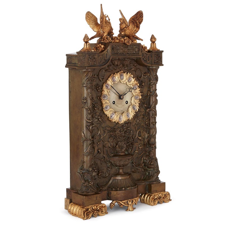 This beautiful and ornate mantel clock was crafted by the famous French metalworker, Jean-François Denière in the first half of the 19th century. In 1804, Denière founded Denière & Fils, which became the chief manufacturer of decorative bronzes in