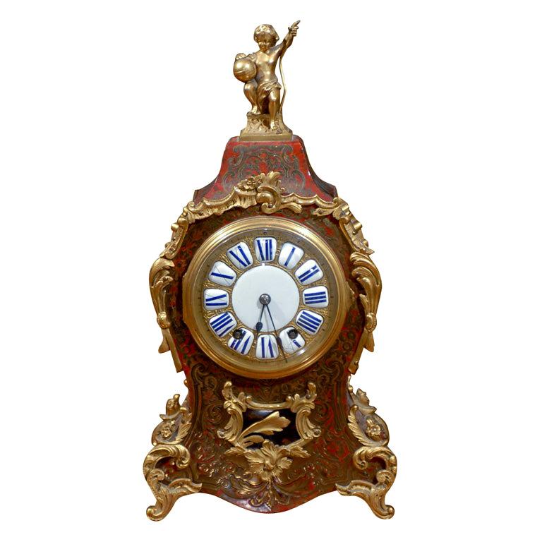 19th Century French Bronze Mounted Boule Mantle Clock with Porcelain Face For Sale