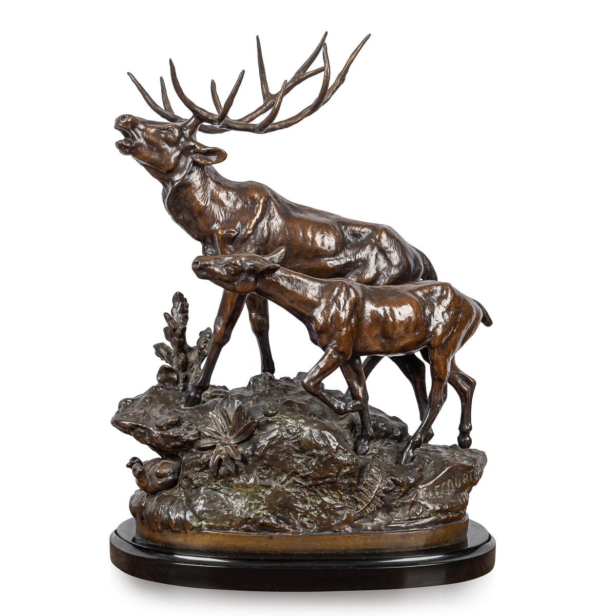 A stunning 19th Century bronze sculpture. Prosper Lecourtier (1851-1924) crafted this bronze sculpture depicting a stag and a doe in a floral forest. At the feet of the animals are a selection of flowers and floral leaves. The base of the bronze is