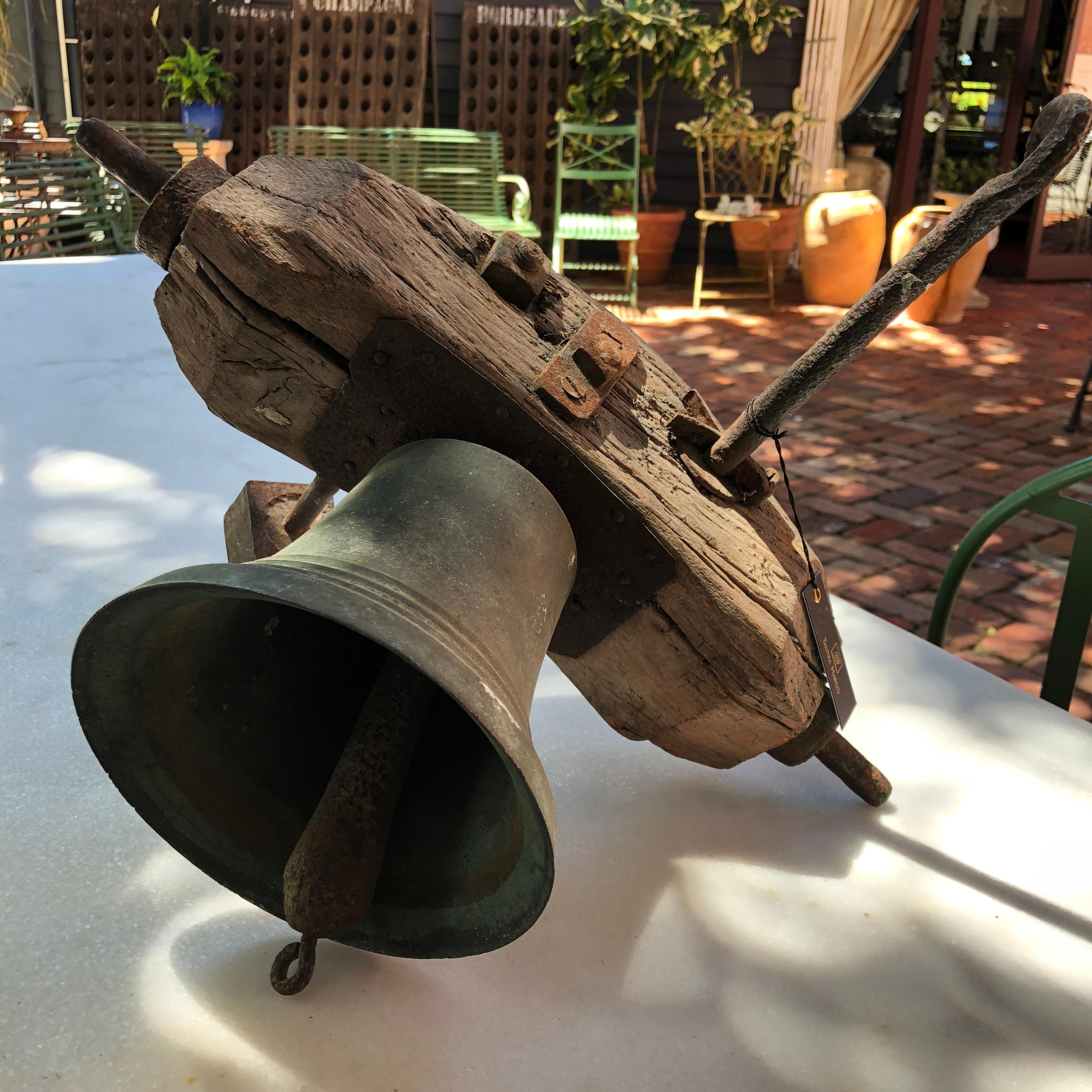 Cast 19th Century French Bronze School Bell with Wooden Beam and Original Clapper For Sale