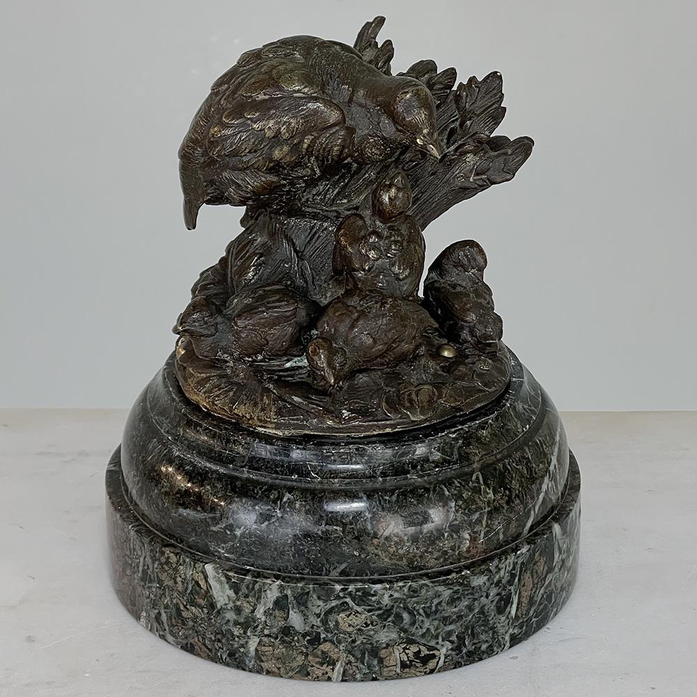 19th century French bronze sculpture of Nesting Quail on marble base will make the perfect decoration for desktop, bookcase, mantel, counter or buffet. It will also make a stunning paperweight for the executive in your family! Depicting a quail hen