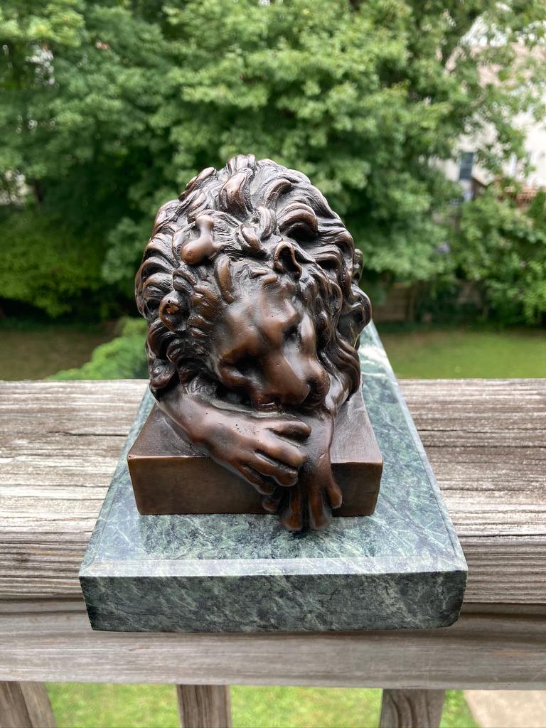 sleeping lion sculpture