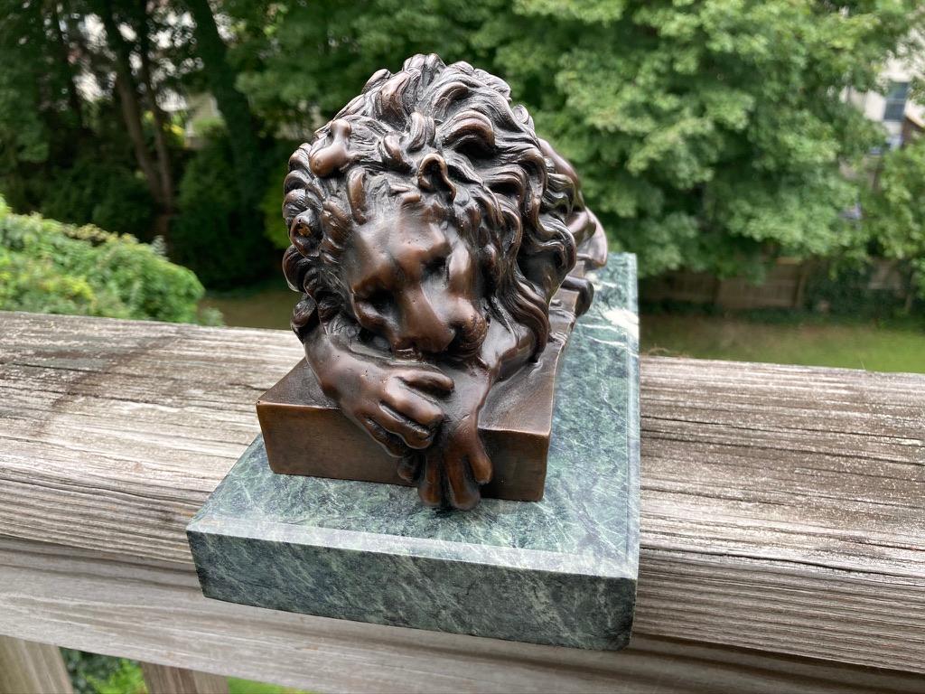 sleeping lion statue