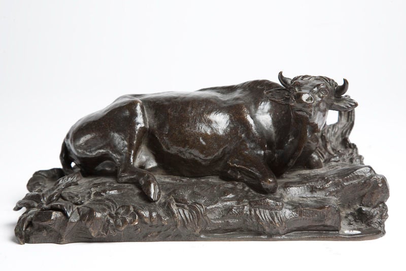 Bronze cast sculpture representing a laying cow. Signed “Fessart“ France, circa 1870.