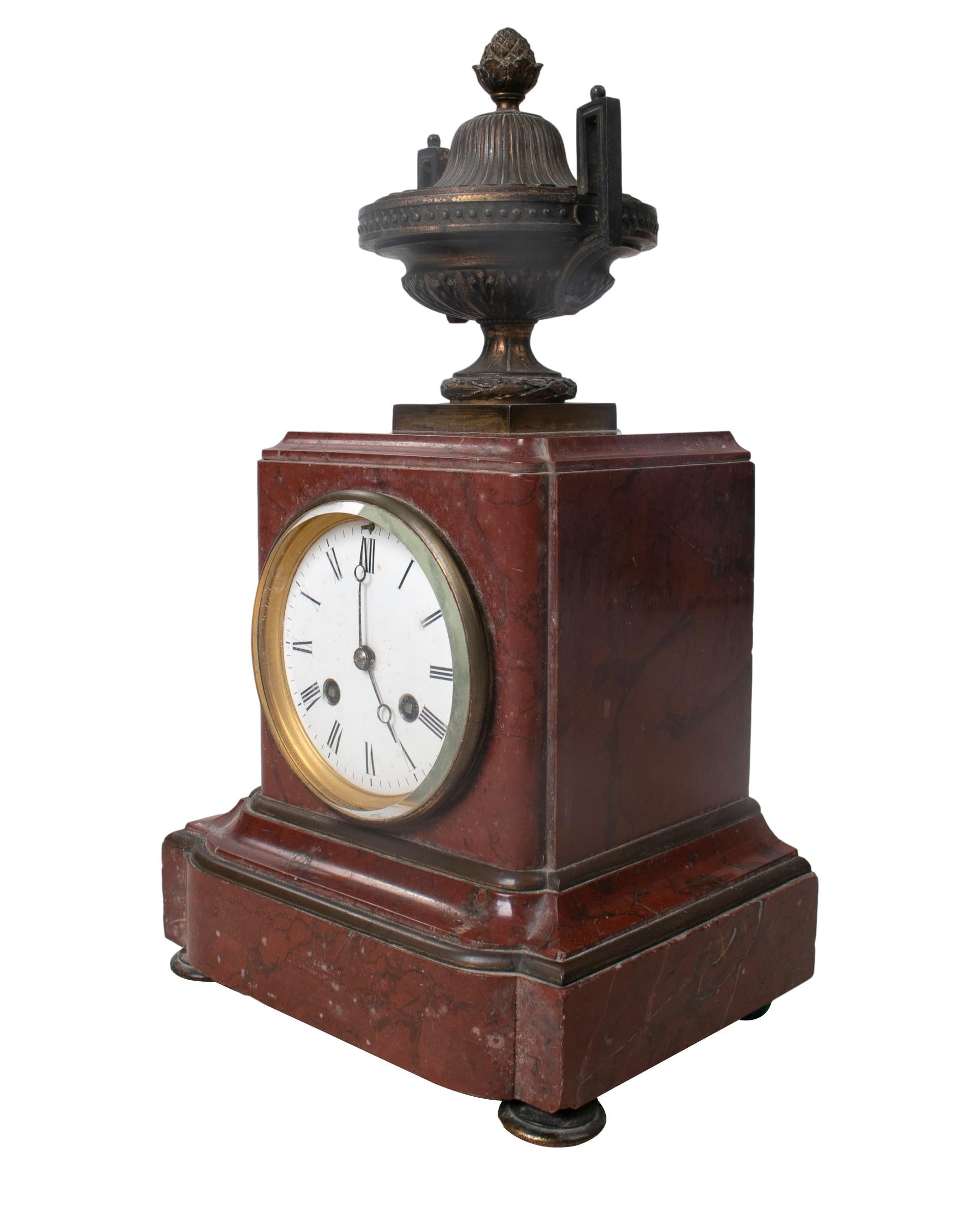 19th century French bronze urn and marble table clock.