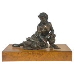 Scultura in bronzo francese del XIX secolo con donna e fiori