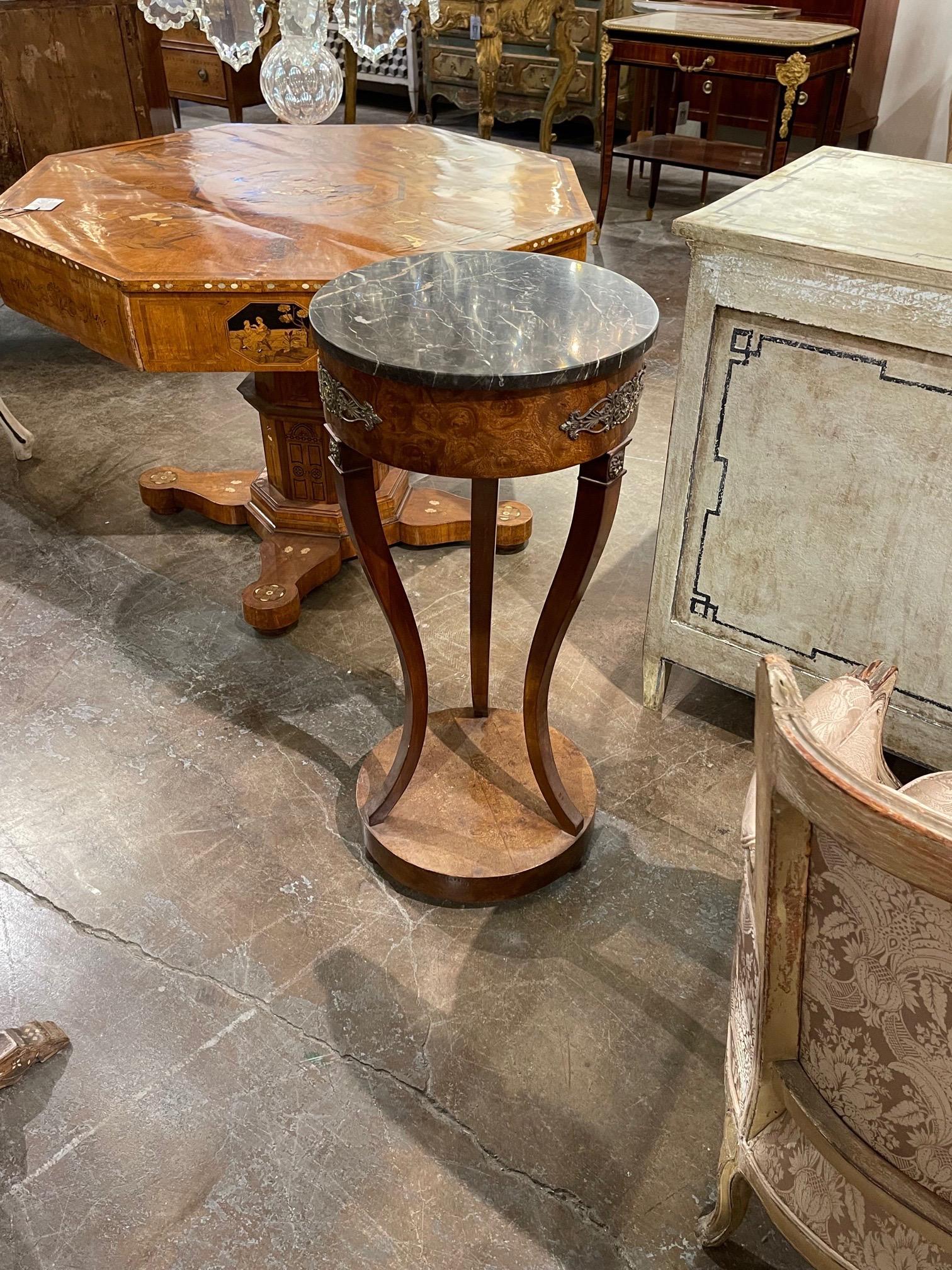 Elegant 19th century French burl walnut pedestal with marble top and brass mounts. A fabulous accent piece!