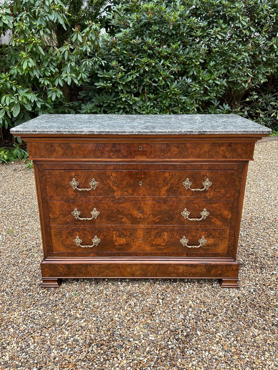A super quality 19th century French Commode chest of drawers with beautiful figured Burr Walnut throughout, and solid removable Marble top, four drawers and original french brass swan neck handles.

circa: 1860

Dimensions:
Height: 38 inches –