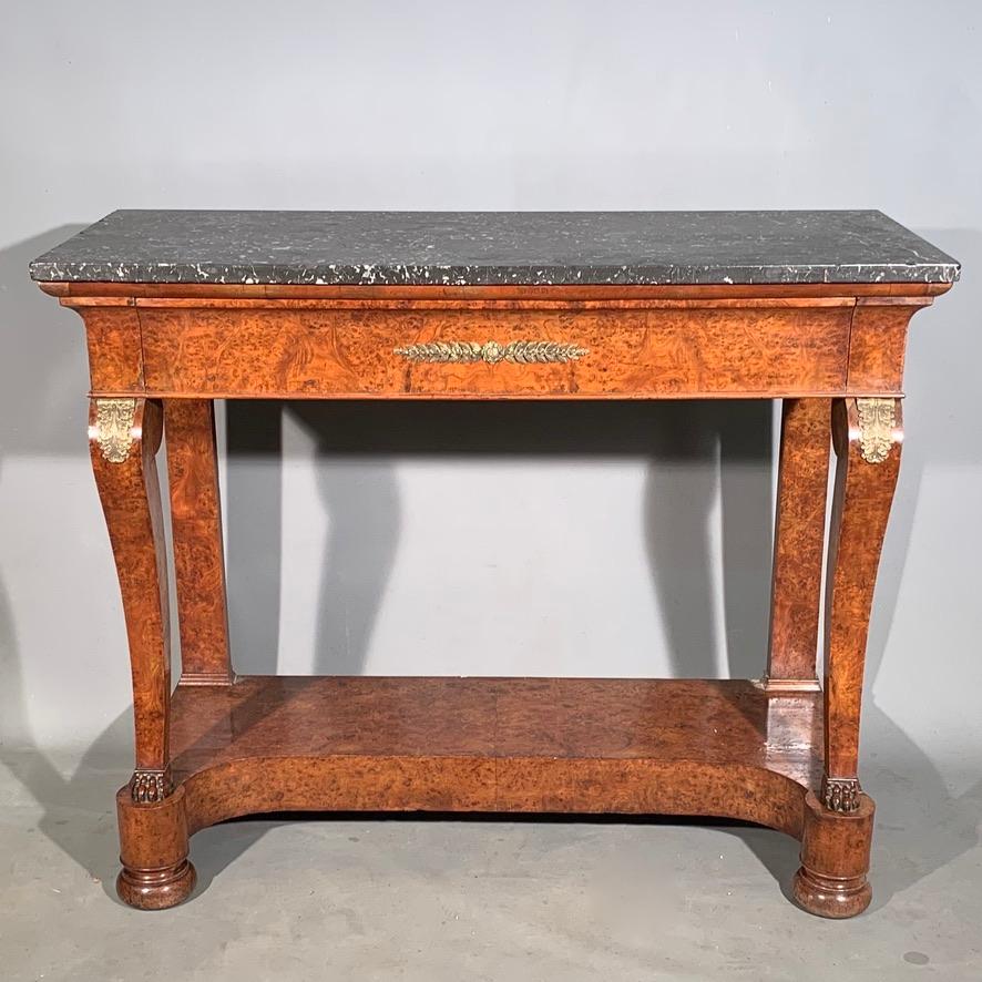 Very good quality French mid-19th century burr walnut and marble top console table, finished with original brass mounts.
Unusual to find in the burr walnut, typically you will find more in mahogany, perhaps rosewood and walnut. The color tone to