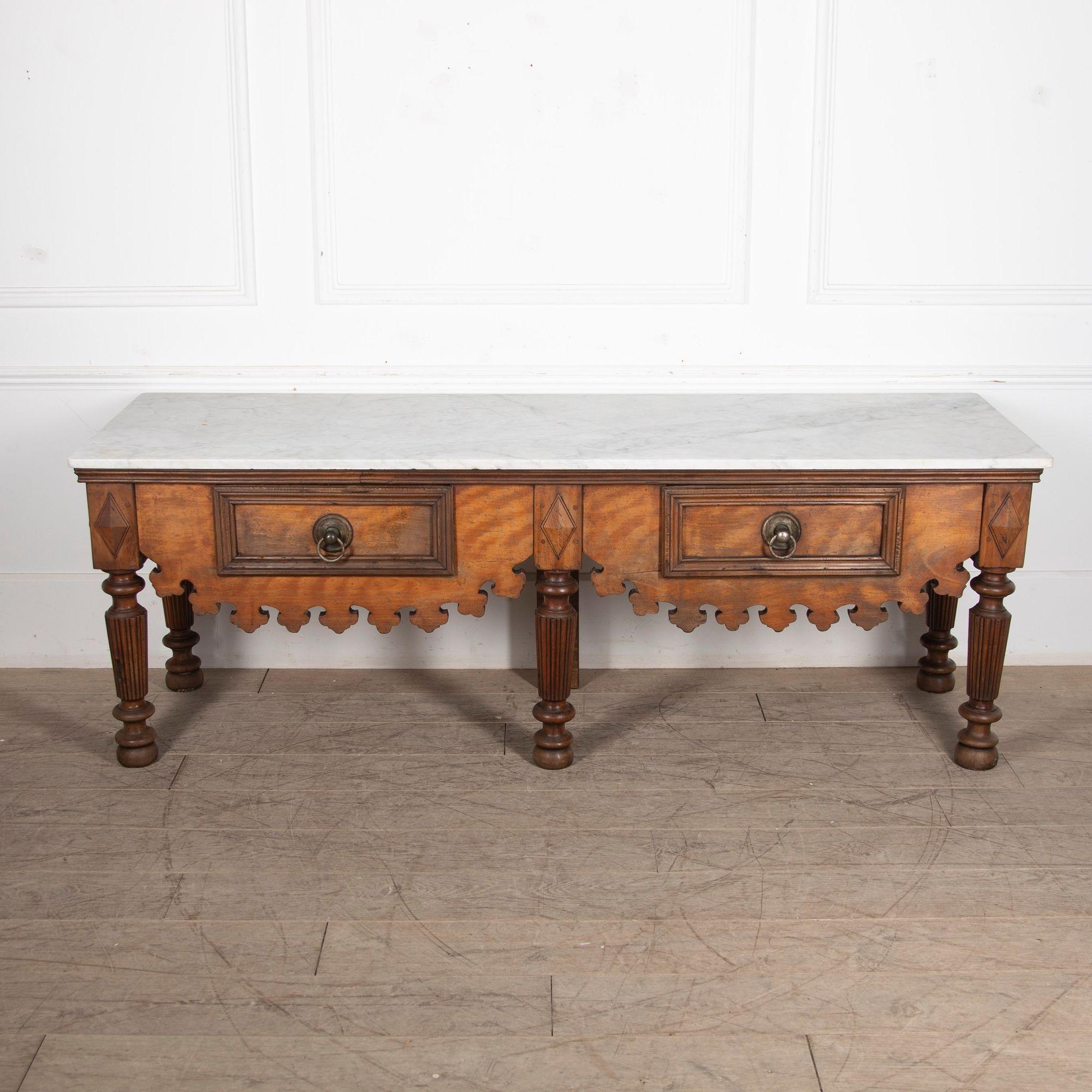 Fabulous late 19th Century marble top butcher's table.
Constructed from beech with two large drawers to the front; both are in full working order. 
With historic signs of wear, adding to its charm. Would make for a fabulous kitchen or serving