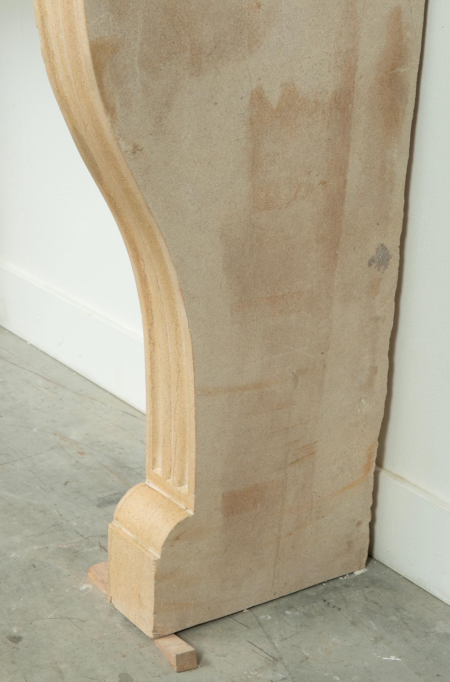 19th Century French Campagnard Limestone Fireplace with Sculpted Scroll Jambs For Sale 8