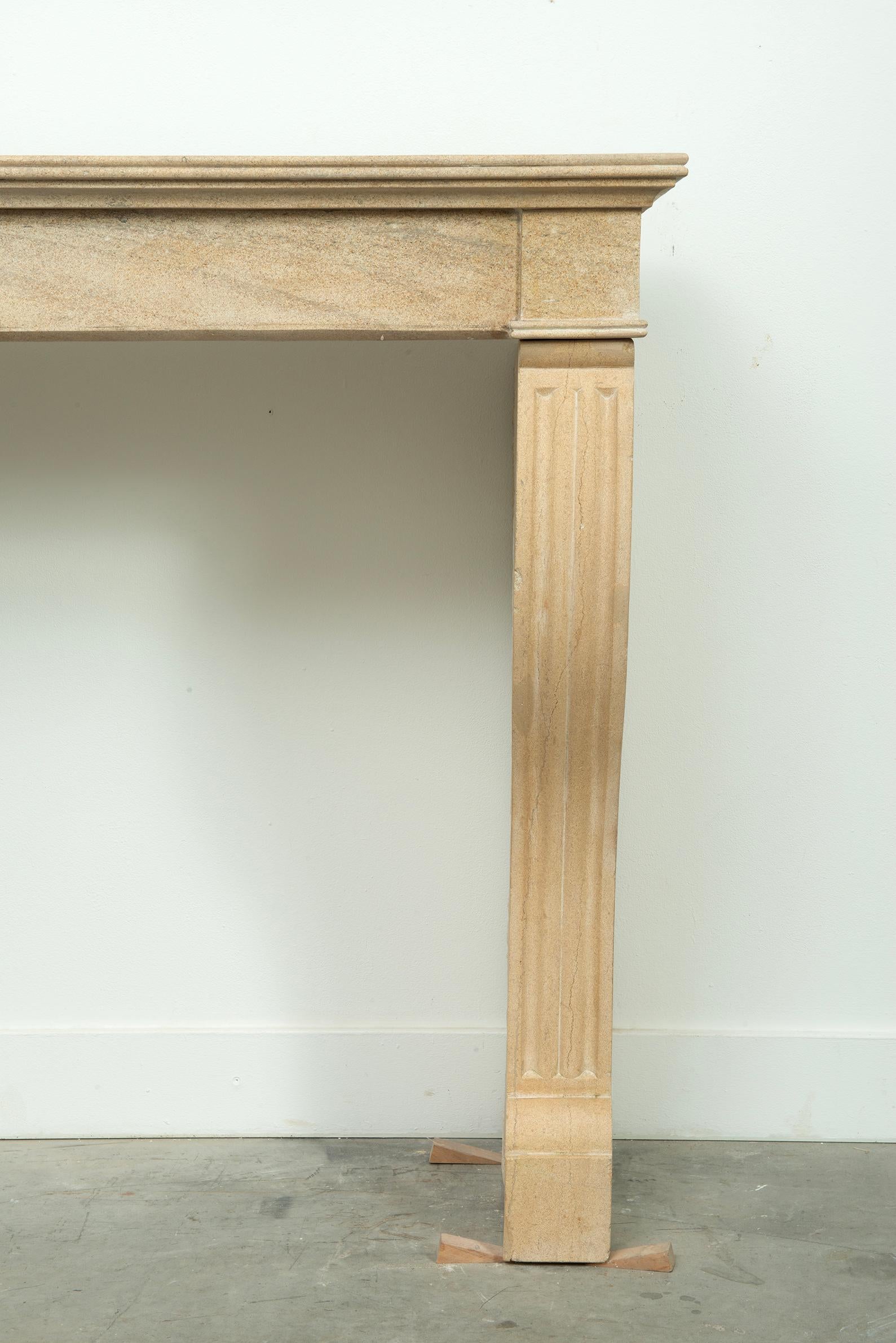 19th Century French Campagnard Limestone Fireplace with Sculpted Scroll Jambs For Sale 11