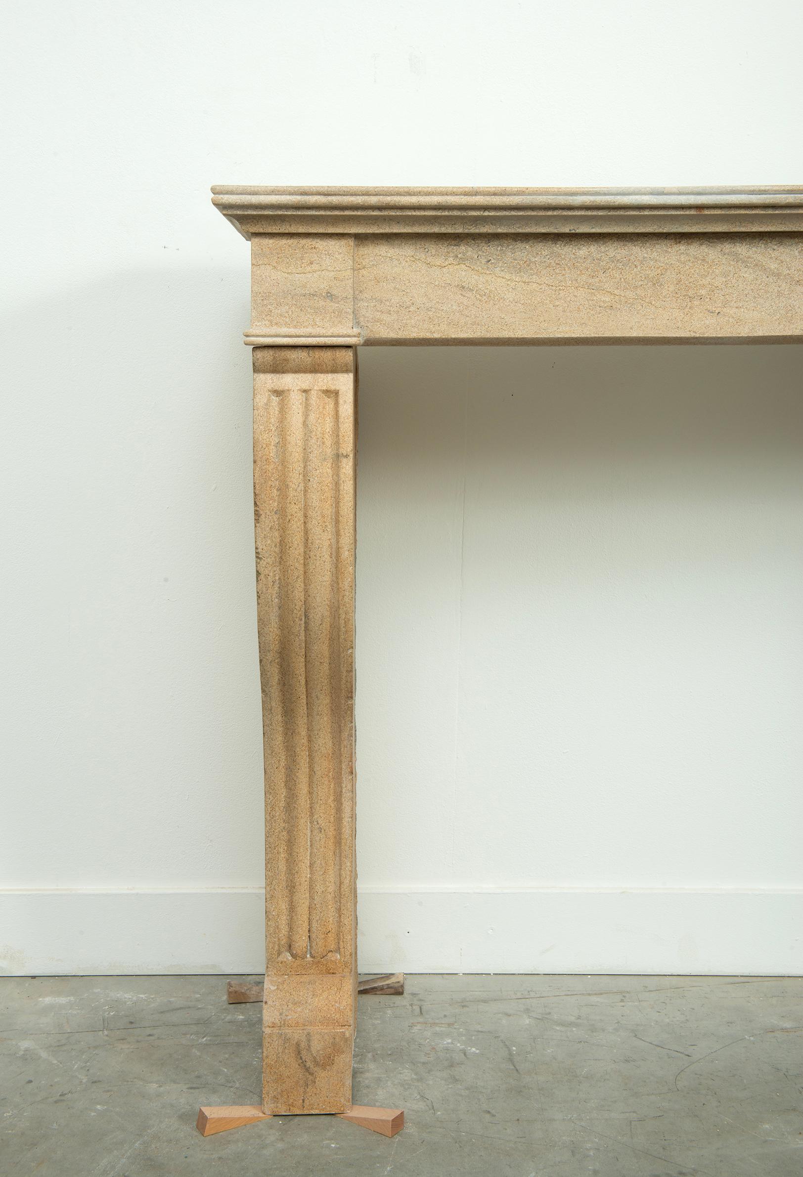 19th Century French Campagnard Limestone Fireplace with Sculpted Scroll Jambs For Sale 12
