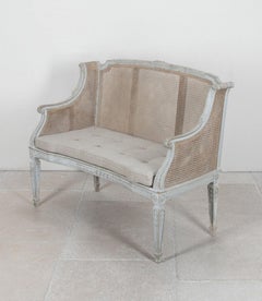 Canape francese con schienale a canna del XIX secolo