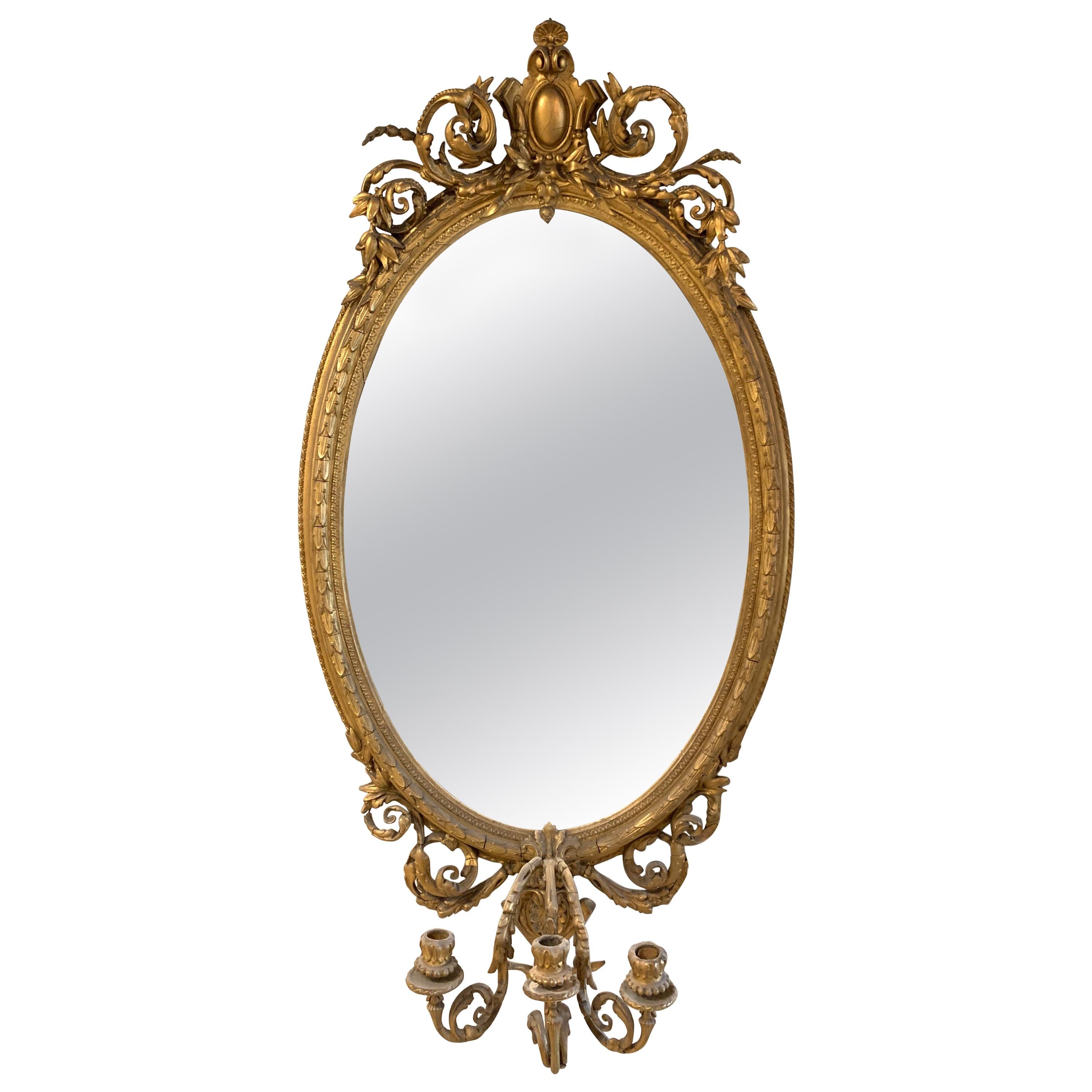 19th Century French Carved and Giltwood Oval Mirror with 3-Arm Sconce